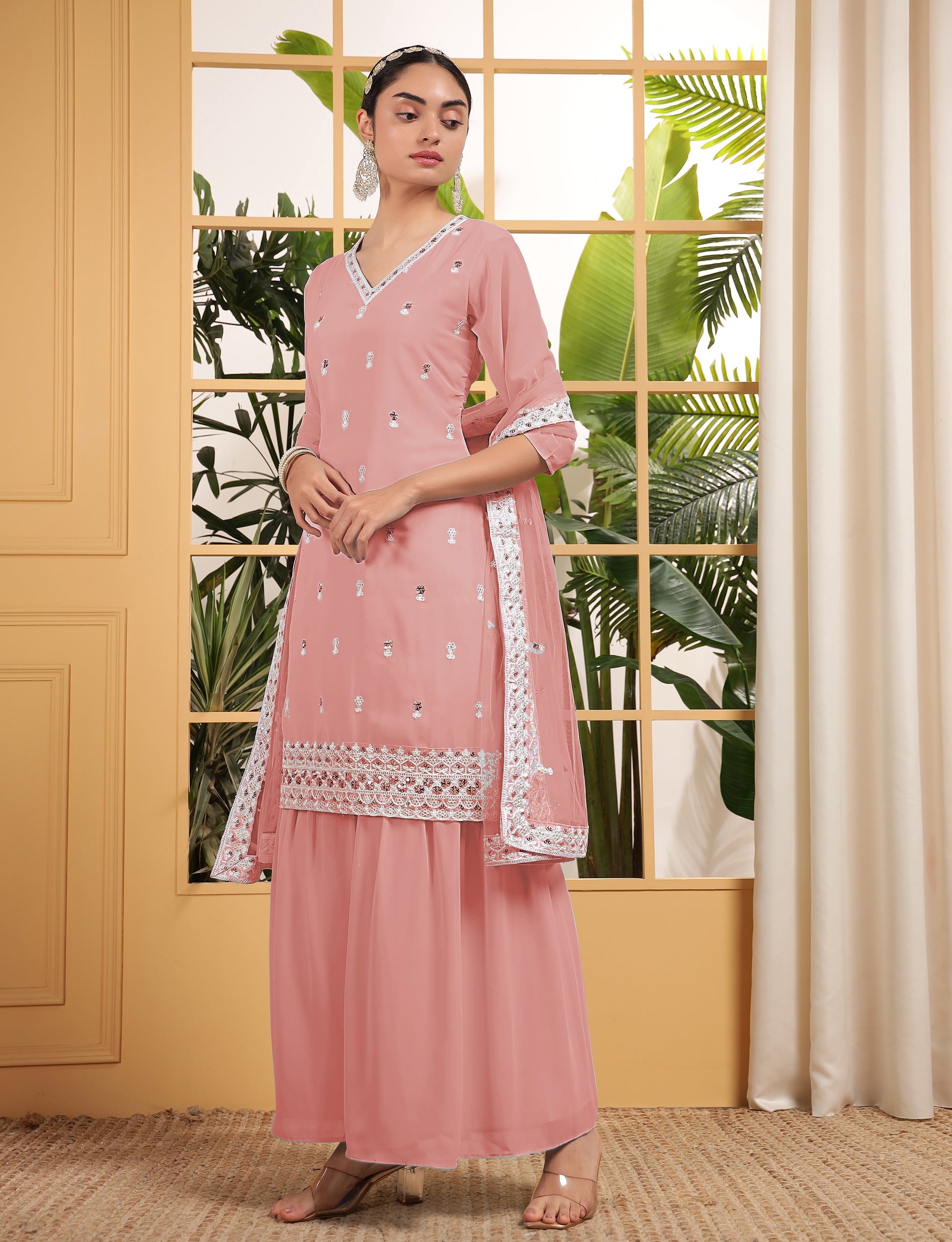 Alluring Peach Sequins Georgette Festive Wear Sharara Suit With Dupatta