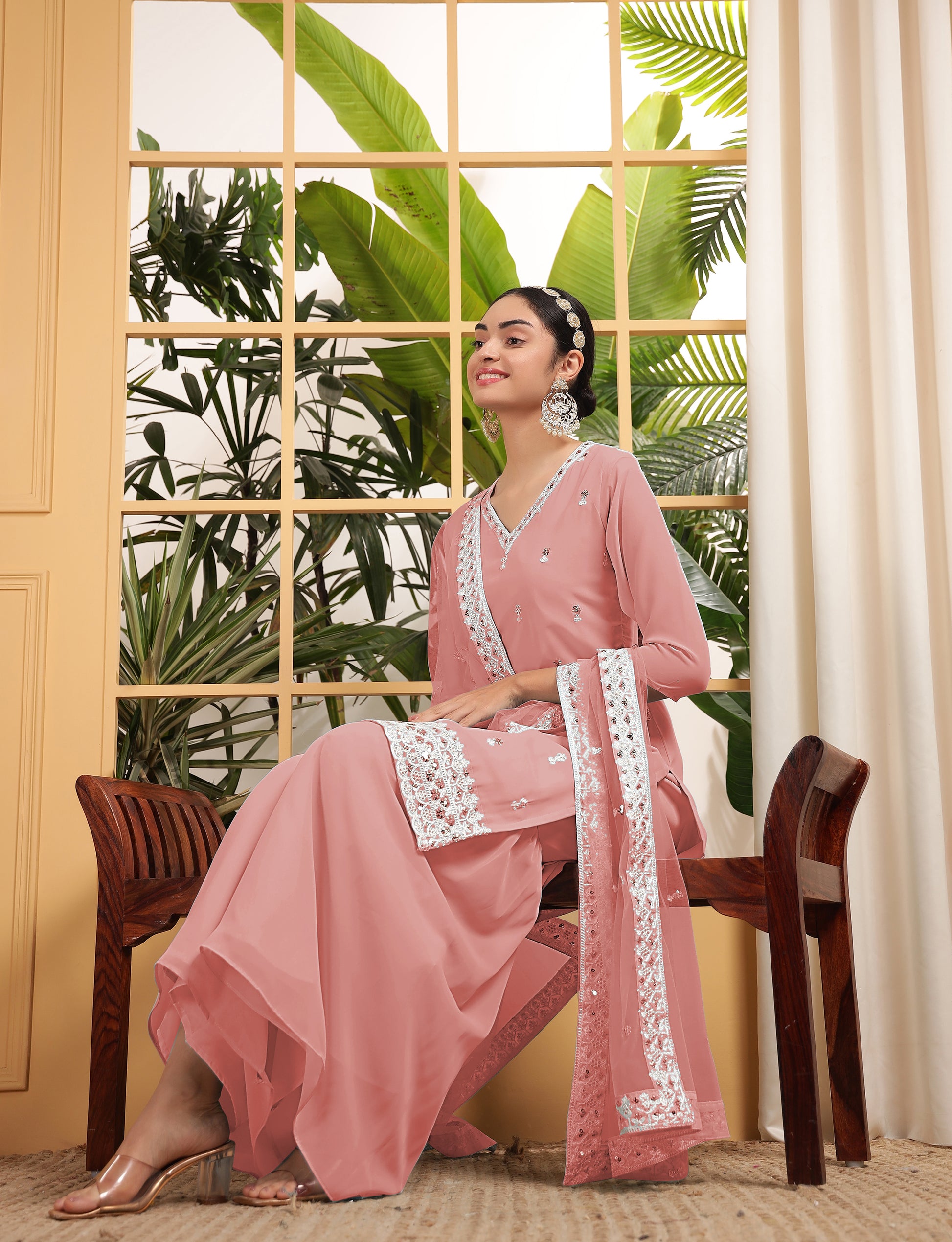 Alluring Peach Sequins Georgette Festive Wear Sharara Suit With Dupatta