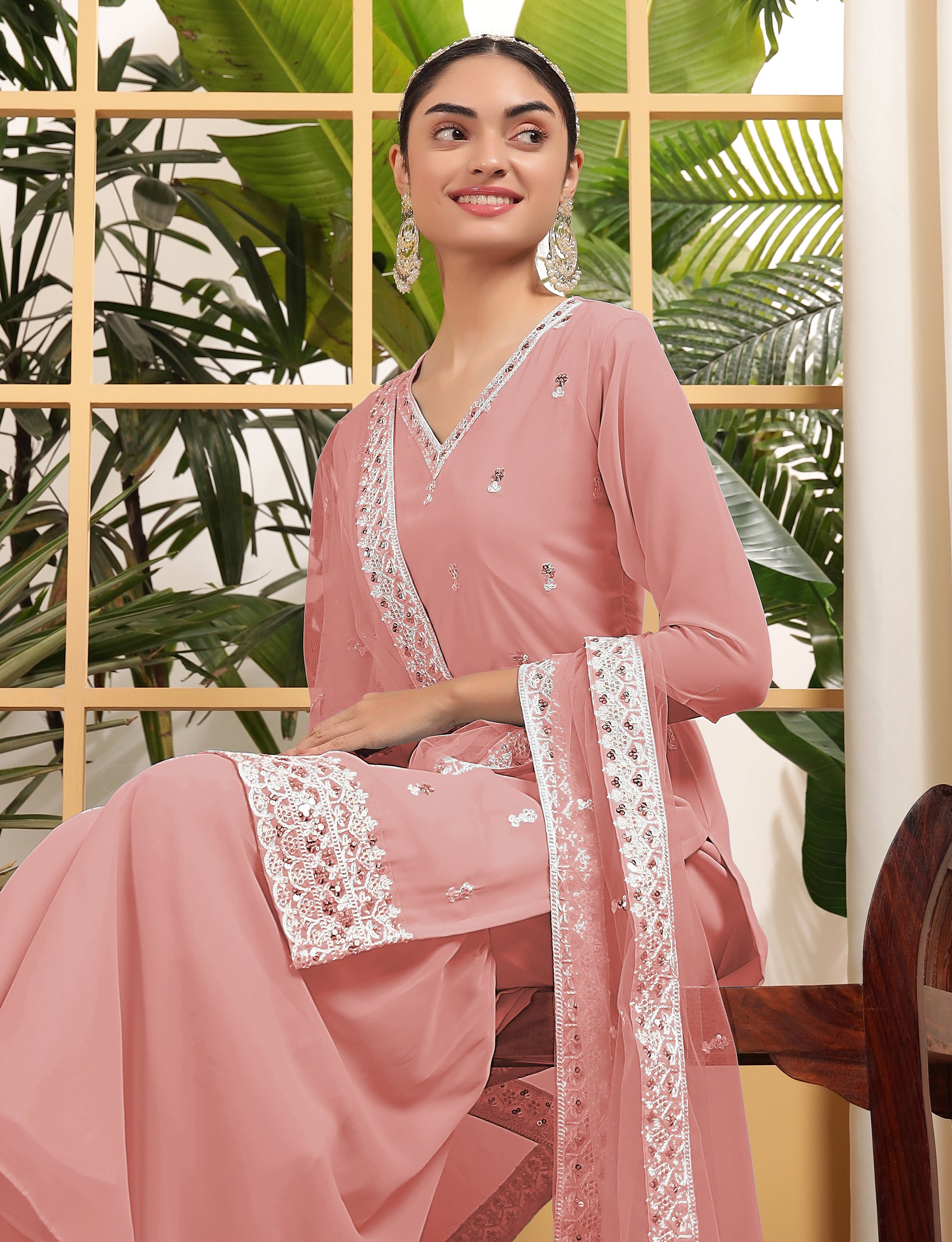 Alluring Peach Sequins Georgette Festive Wear Sharara Suit With Dupatta