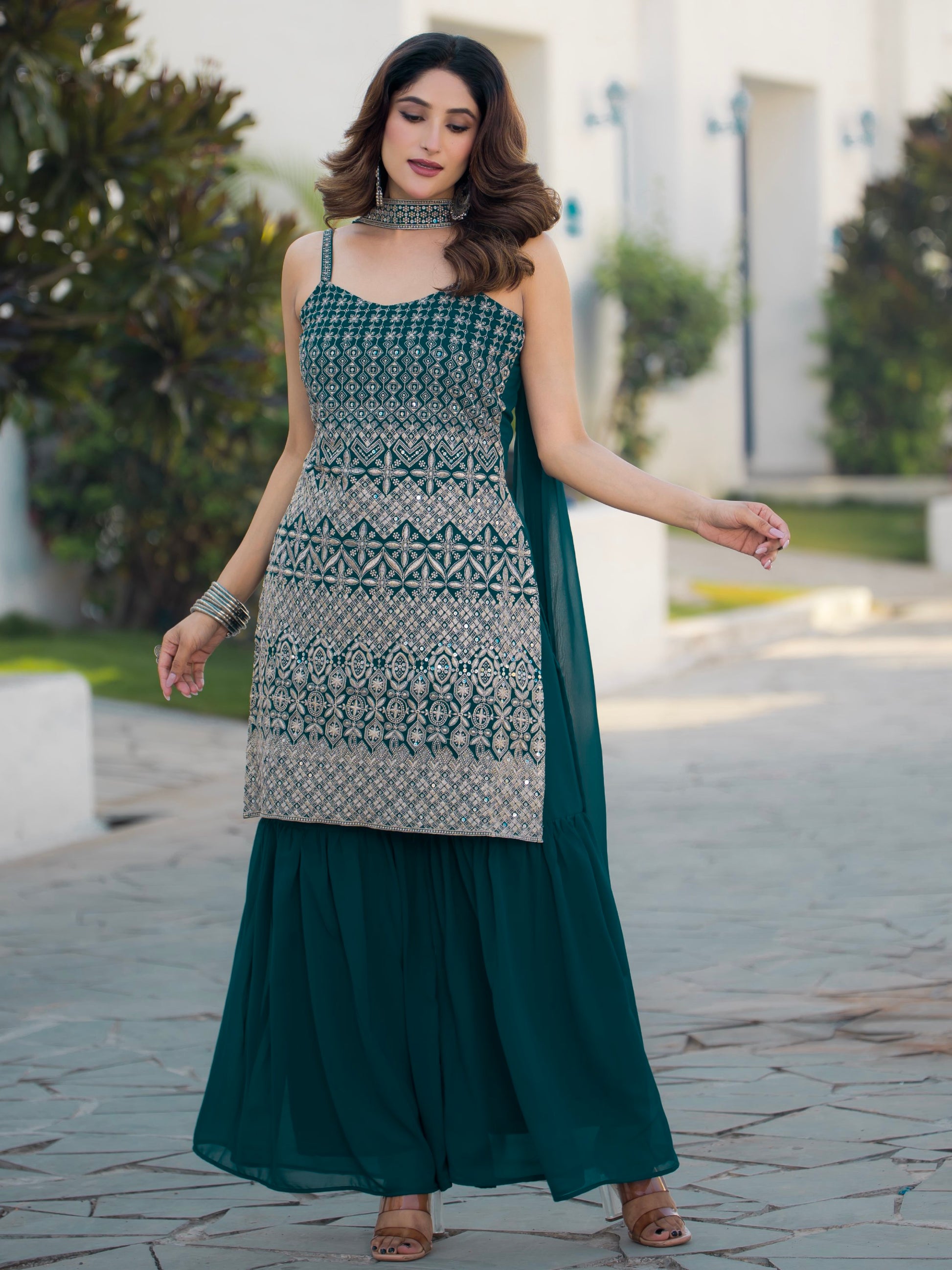 Spectacular Teal Blue Sequins Georgette Festive Wear Sharara Suit With Dupatta