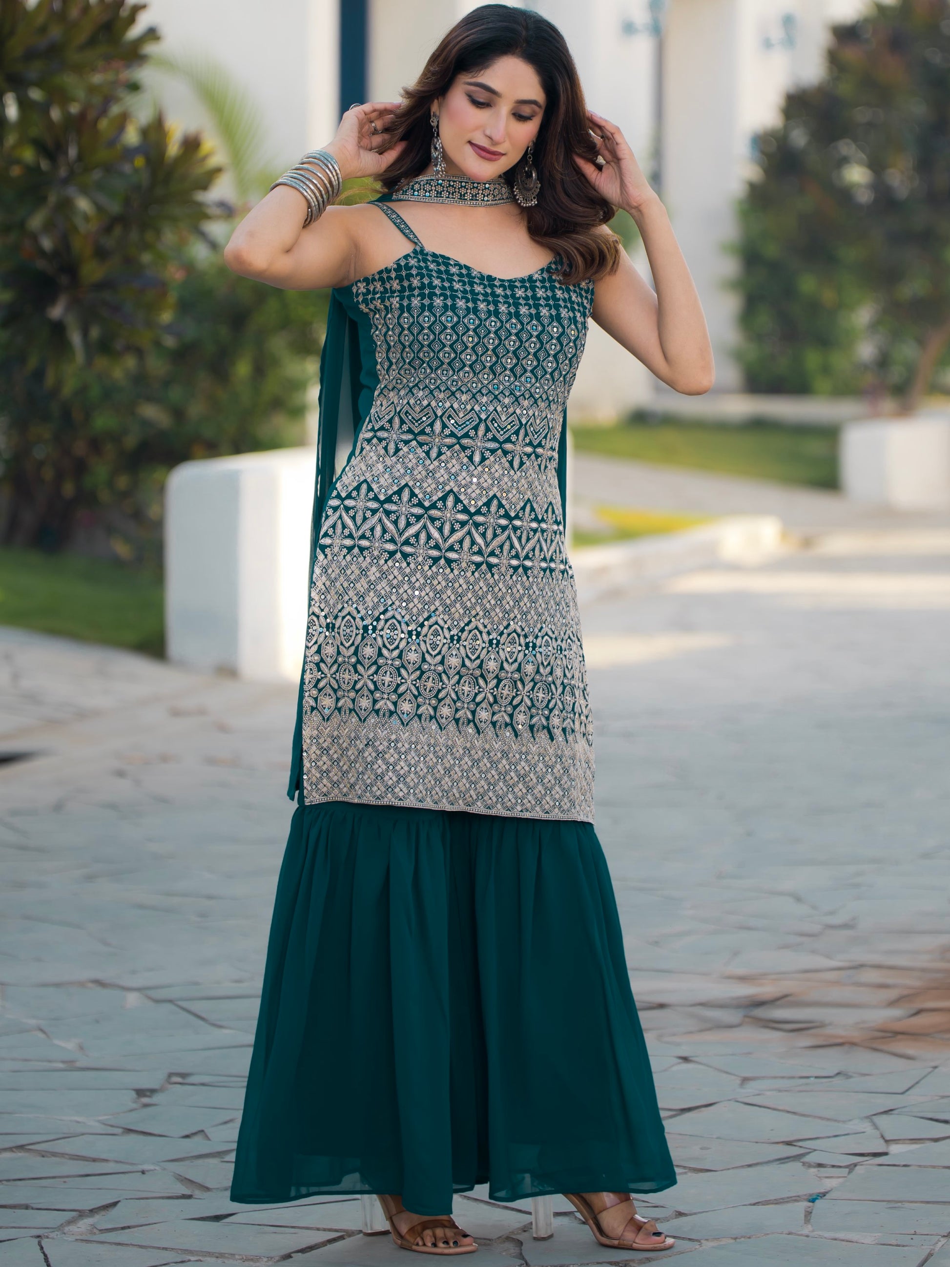 Spectacular Teal Blue Sequins Georgette Festive Wear Sharara Suit With Dupatta