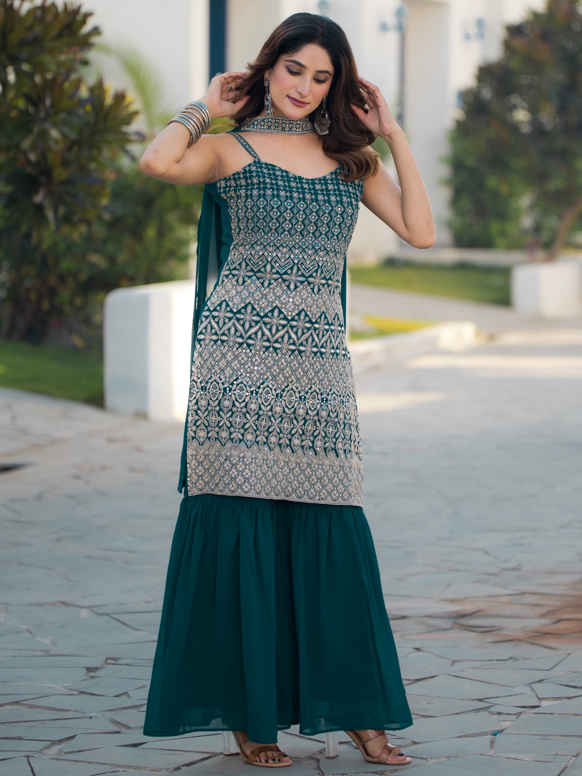Spectacular Teal Blue Sequins Georgette Festive Wear Sharara Suit With Dupatta