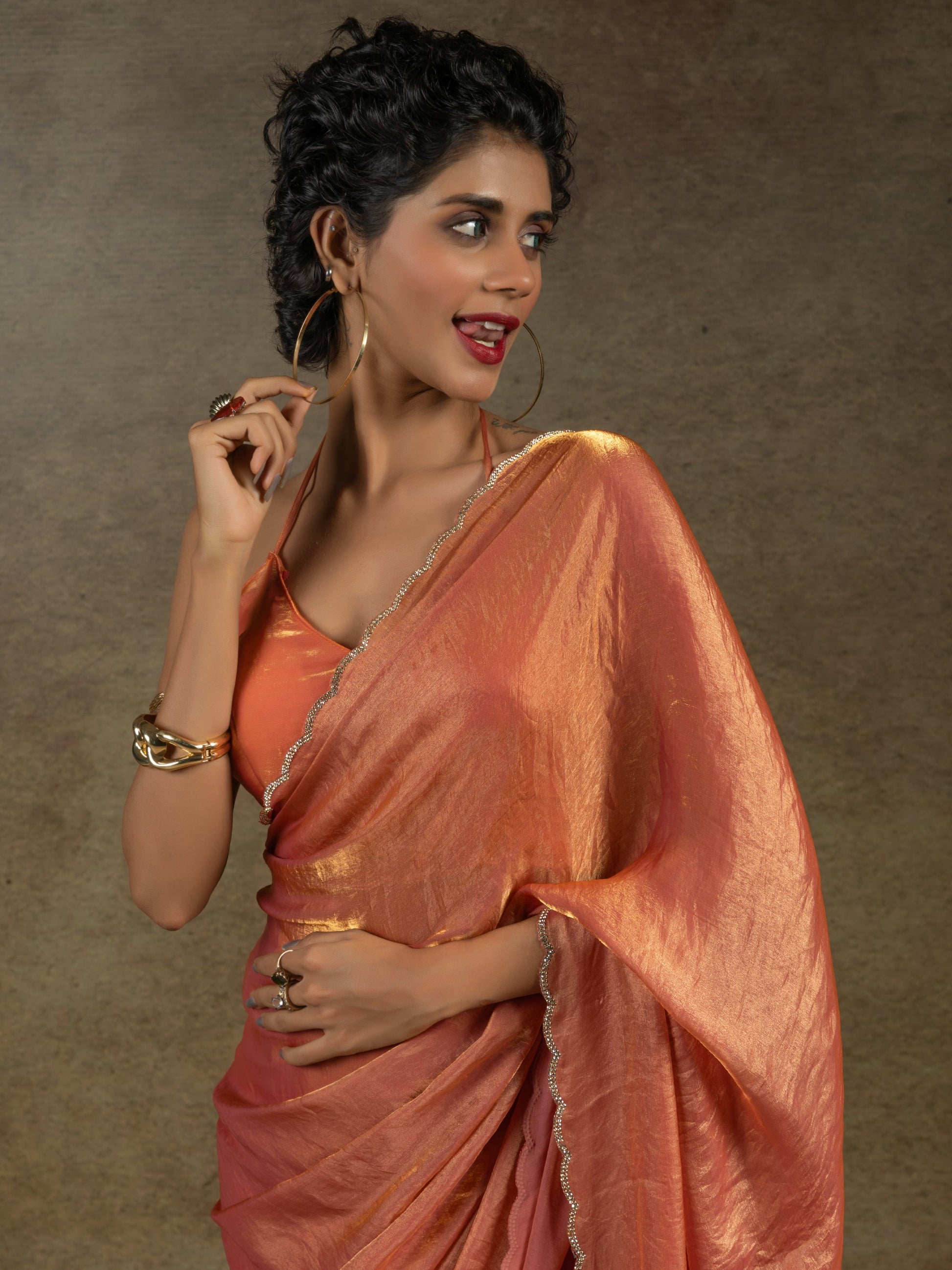 Fabulous Peach Border Work Satin Event Wear Pre-Stitched Saree With Blouse