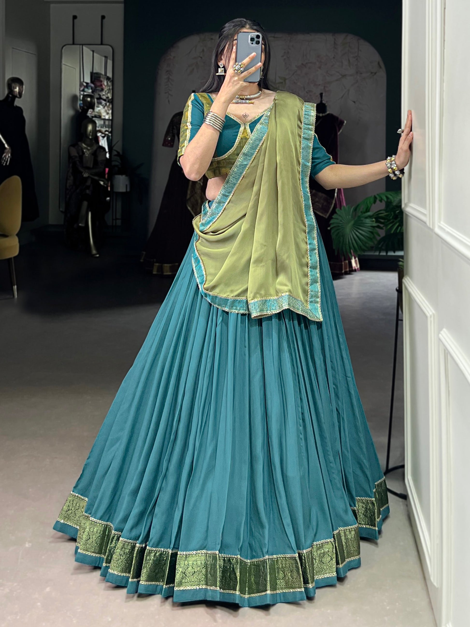Superb Teal Blue Zari Weaving Rayon Festive Wear Lehenga Choli With Dupatta