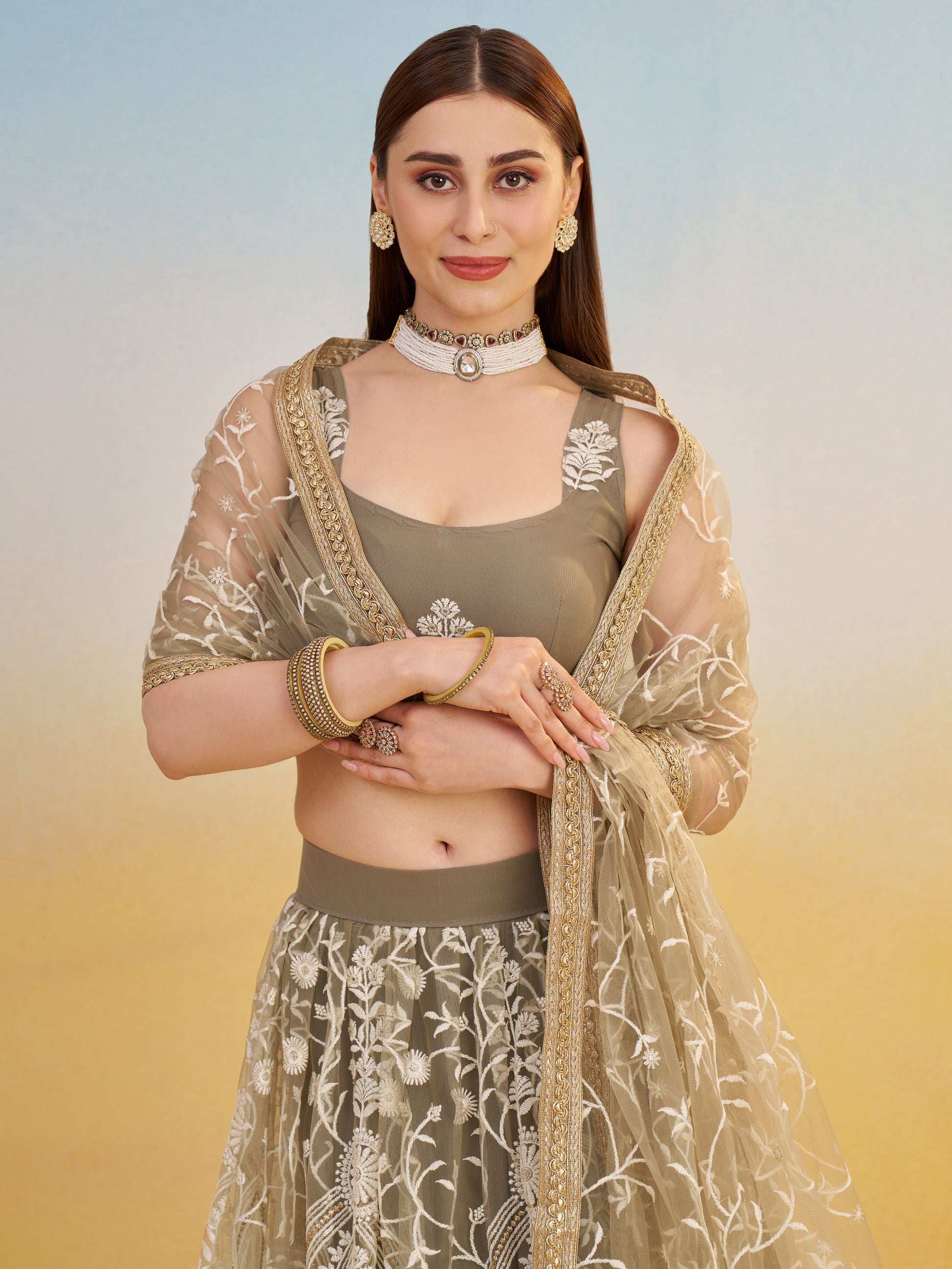 Elegant Brown Embroidered Net Wedding Wear Lehenga Choli With Dupatta