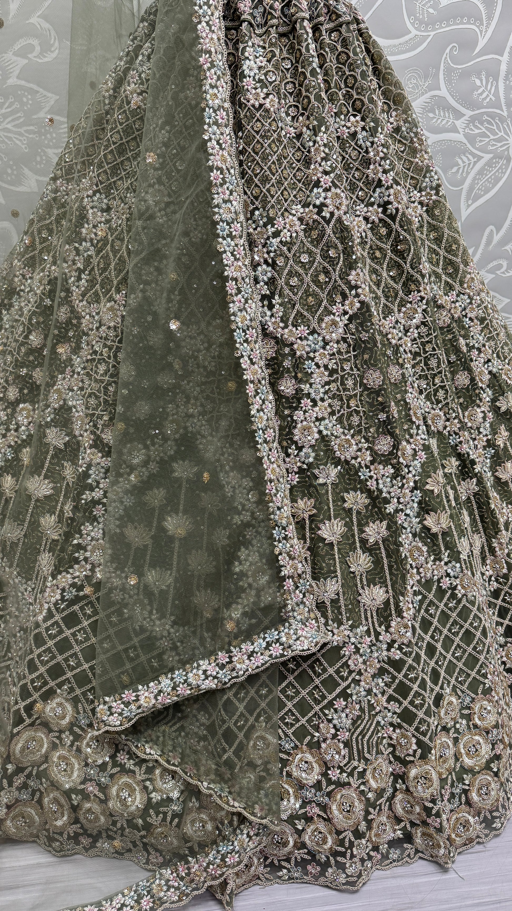 Pretty Green Thread Embroidery Net Bridal Lehenga Choli With Dupatta