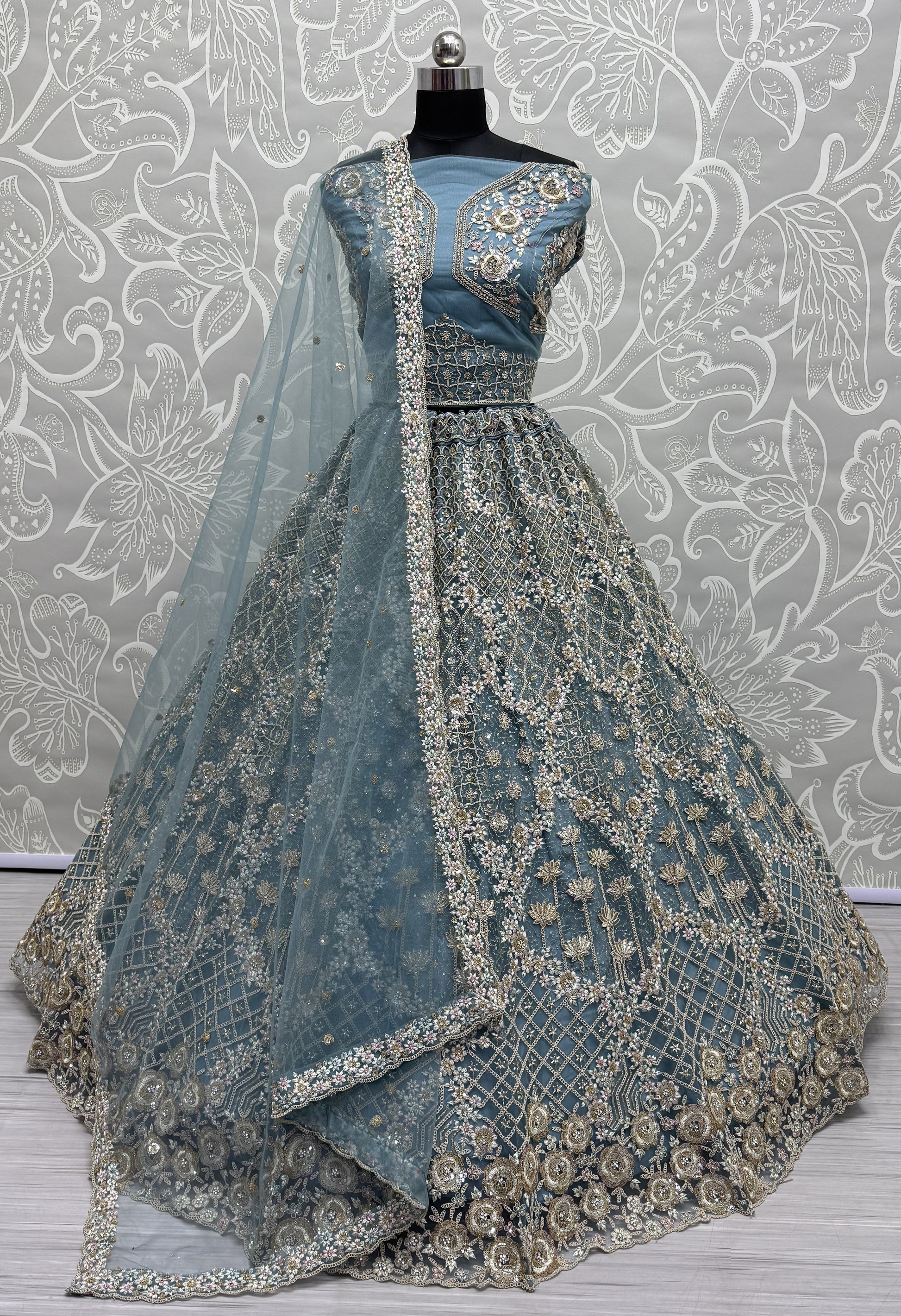 fascinating Blue Thread Work Net Designer Lehenga Choli With Dupatta
