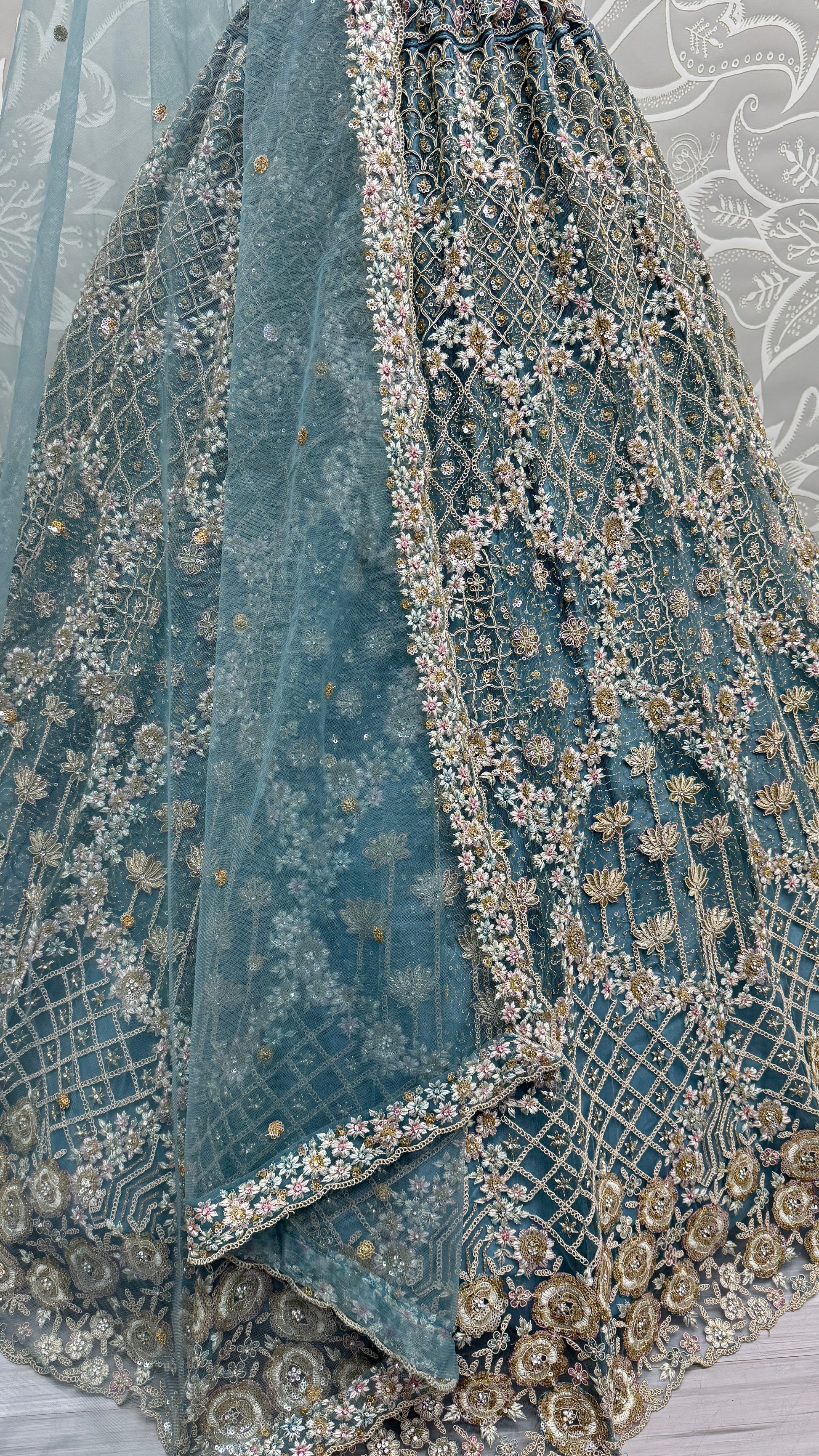 fascinating Blue Thread Work Net Designer Lehenga Choli With Dupatta