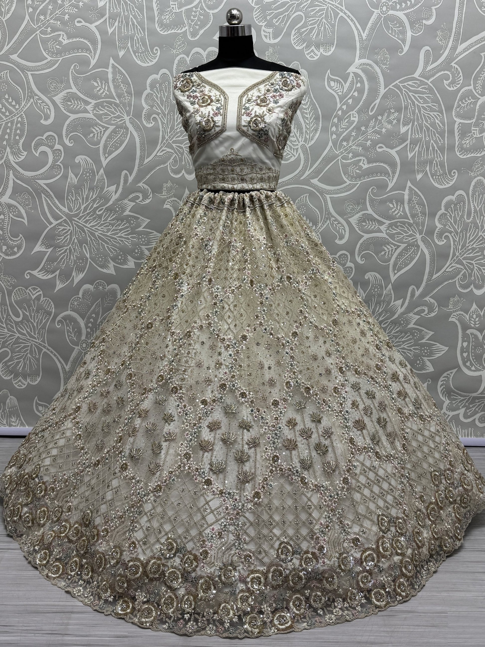 Wonderful Off-White Zirkon Work Net Bridesmaid Lehenga Choli With Dupatta