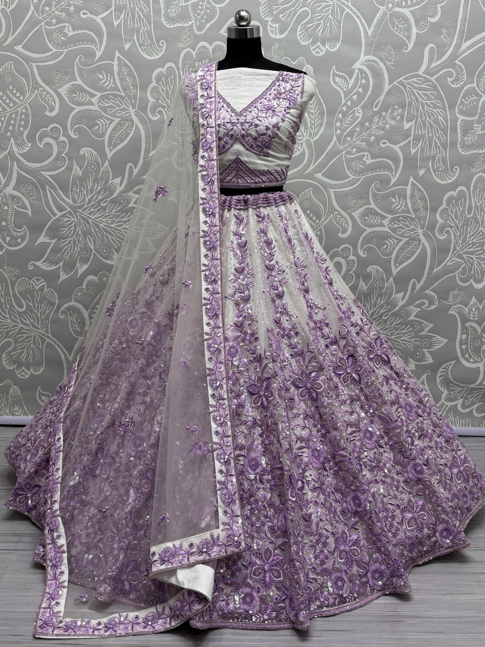 Beautiful Purple Multi Thread Work Net Wedding Lehenga Choli
