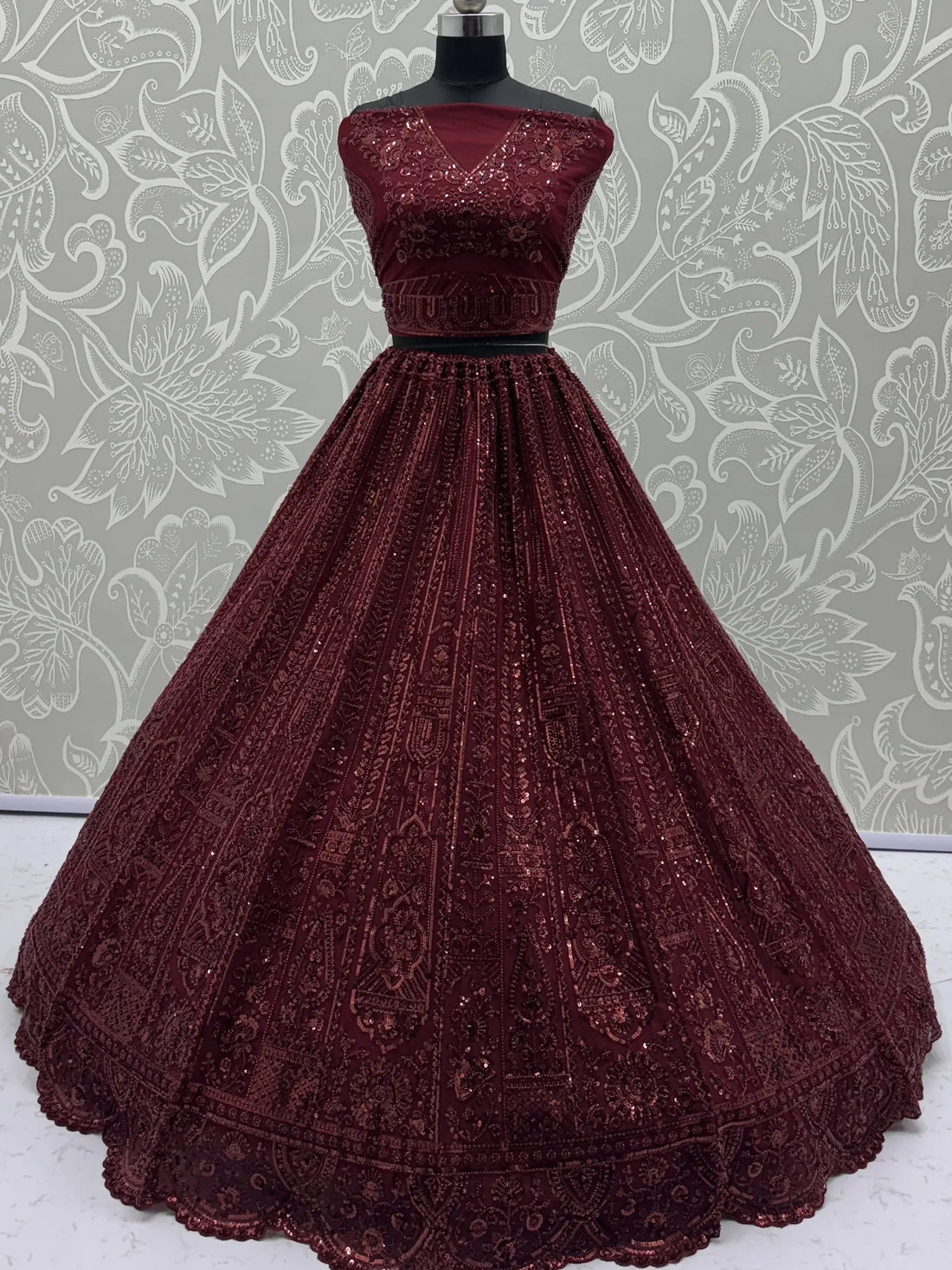 Stellar Maroon Thread Work Net Bridal Lehenga Choli With Dupatta