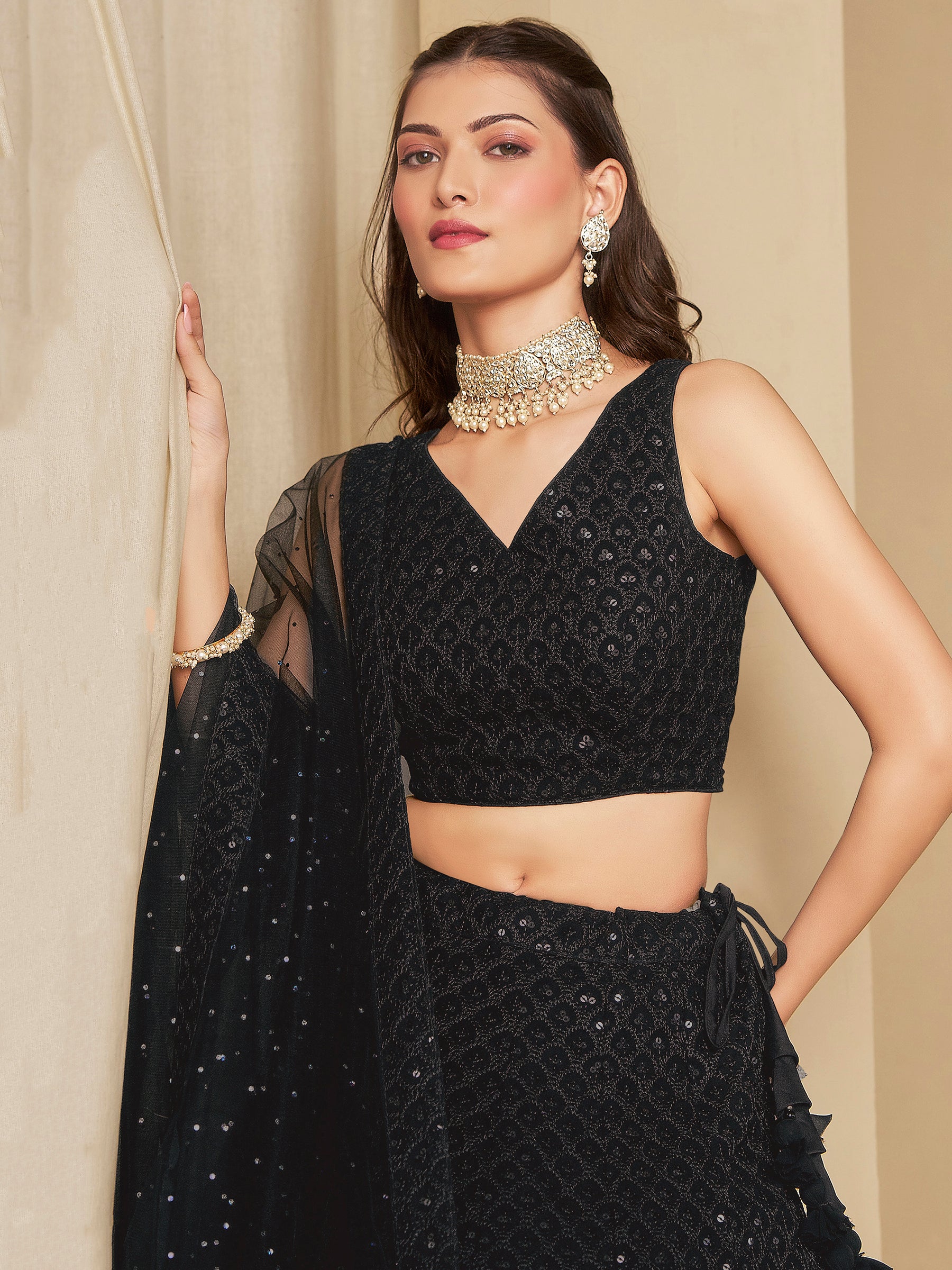 Wonderful Black Sequins Georgette Reception Wear Lehenga Choli