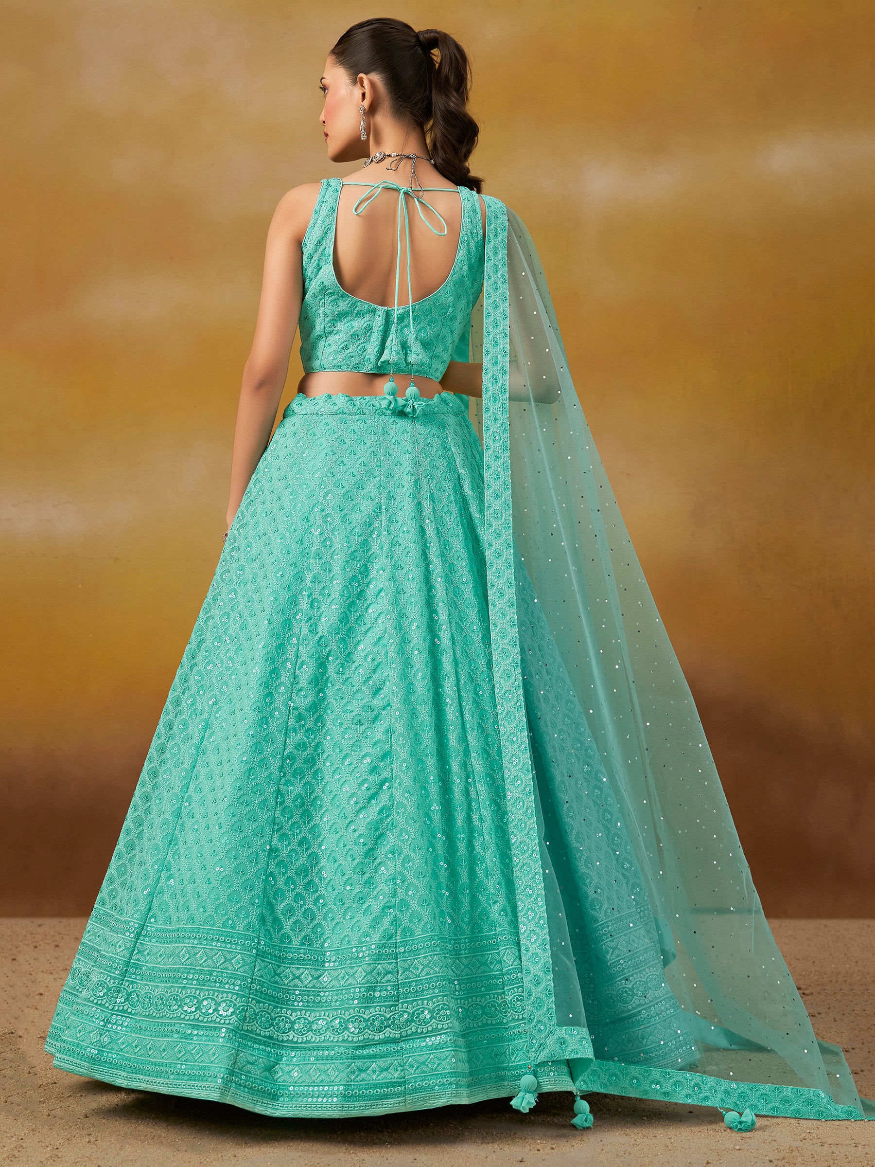 Astounding Sky-Blue Sequins Georgette Engagement Wear Lehenga Choli
