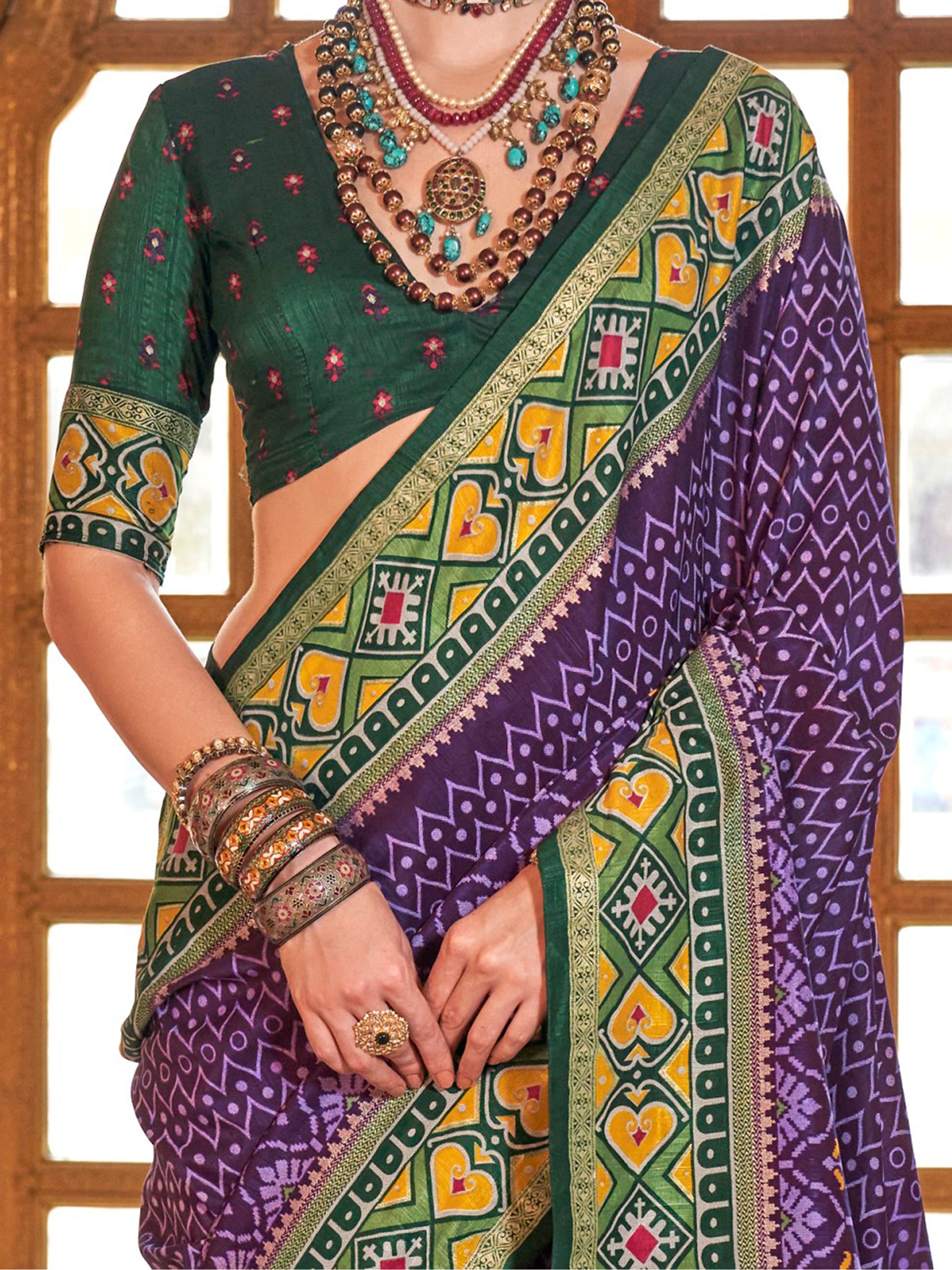 Stunning Purple Patola Printed Silk Casual Wear Saree With Blouse