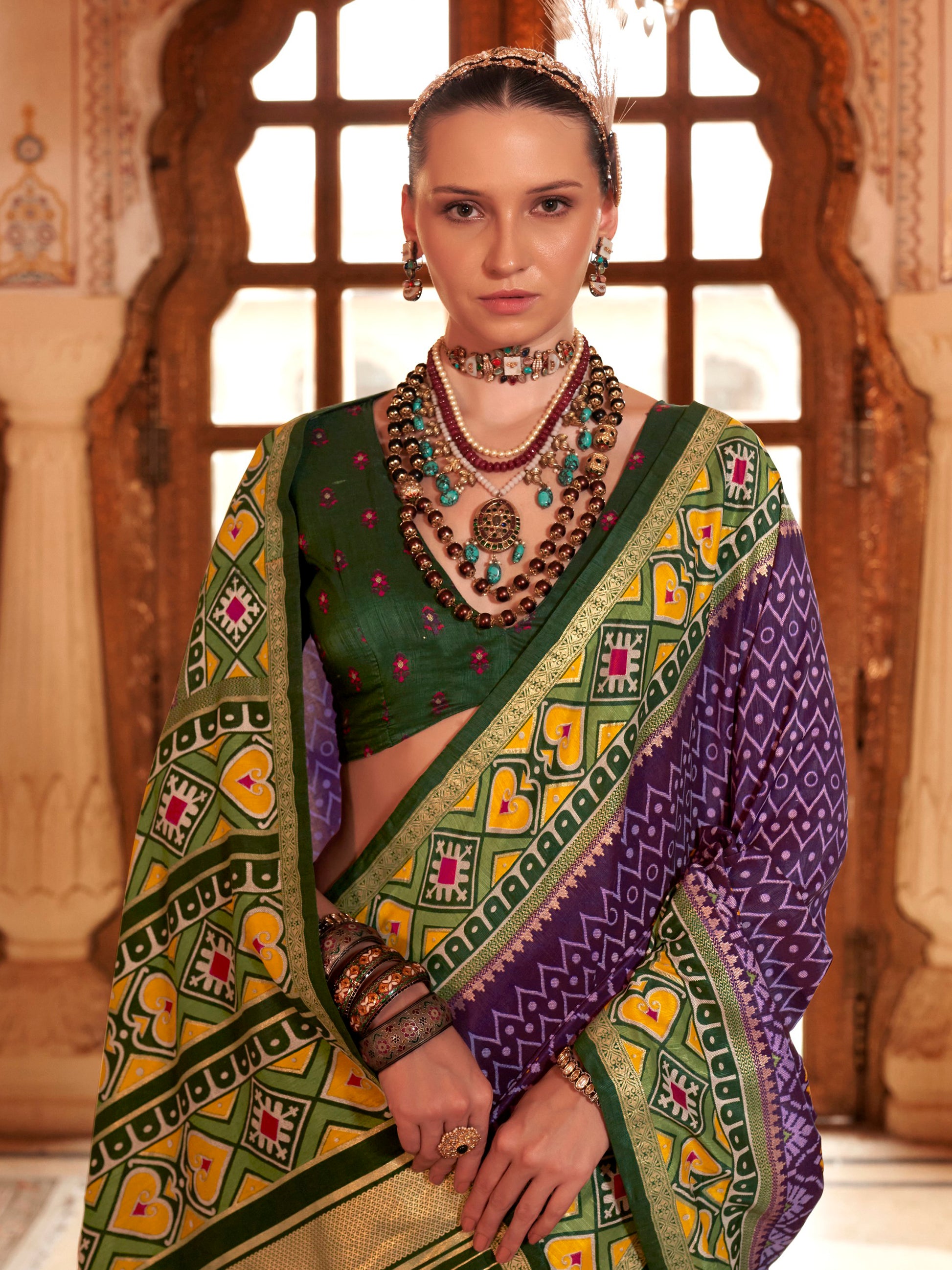 Stunning Purple Patola Printed Silk Casual Wear Saree With Blouse