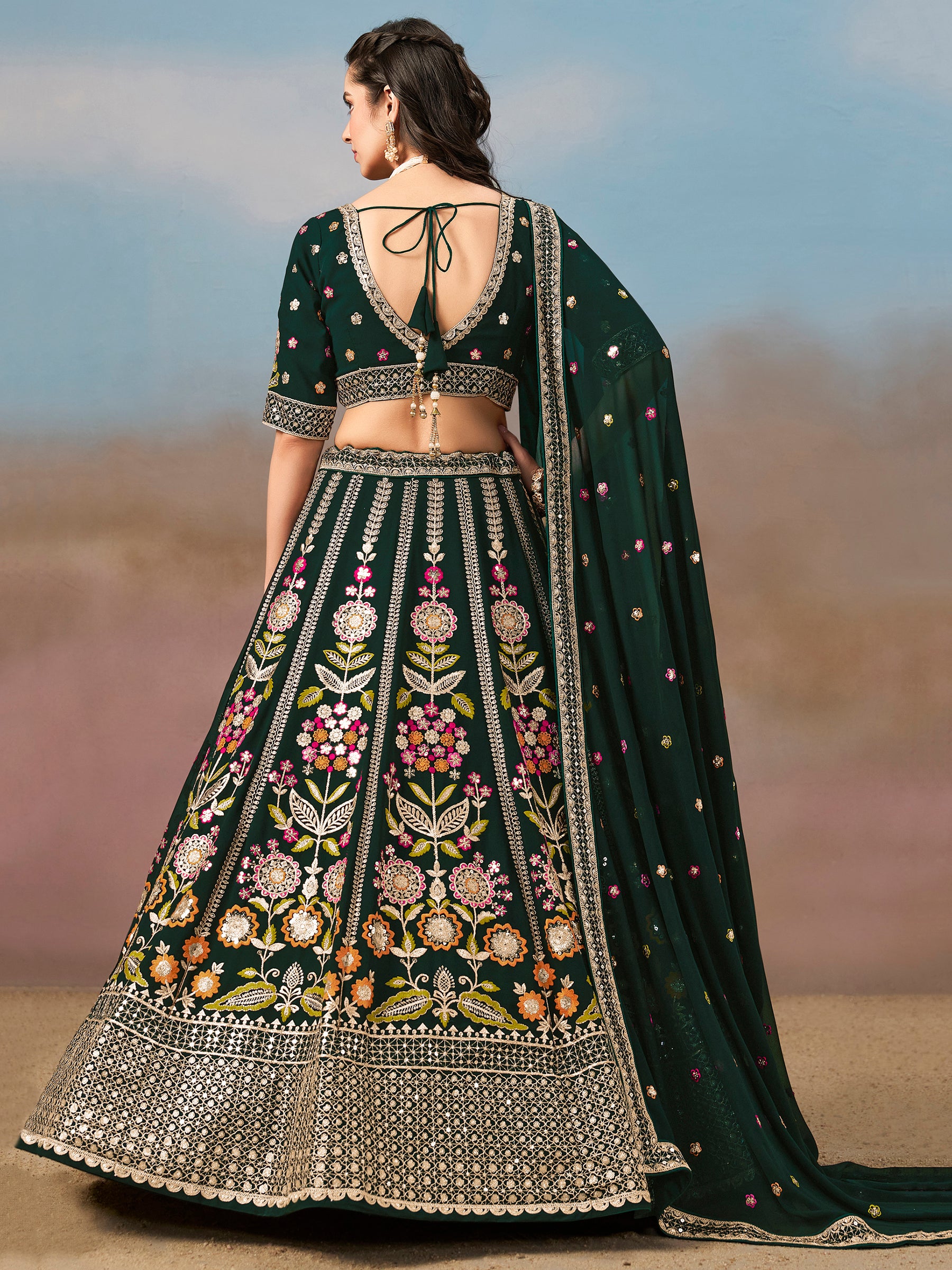 Fascinating Green Sequins Georgette Mehendi Wear Lehenga Choli