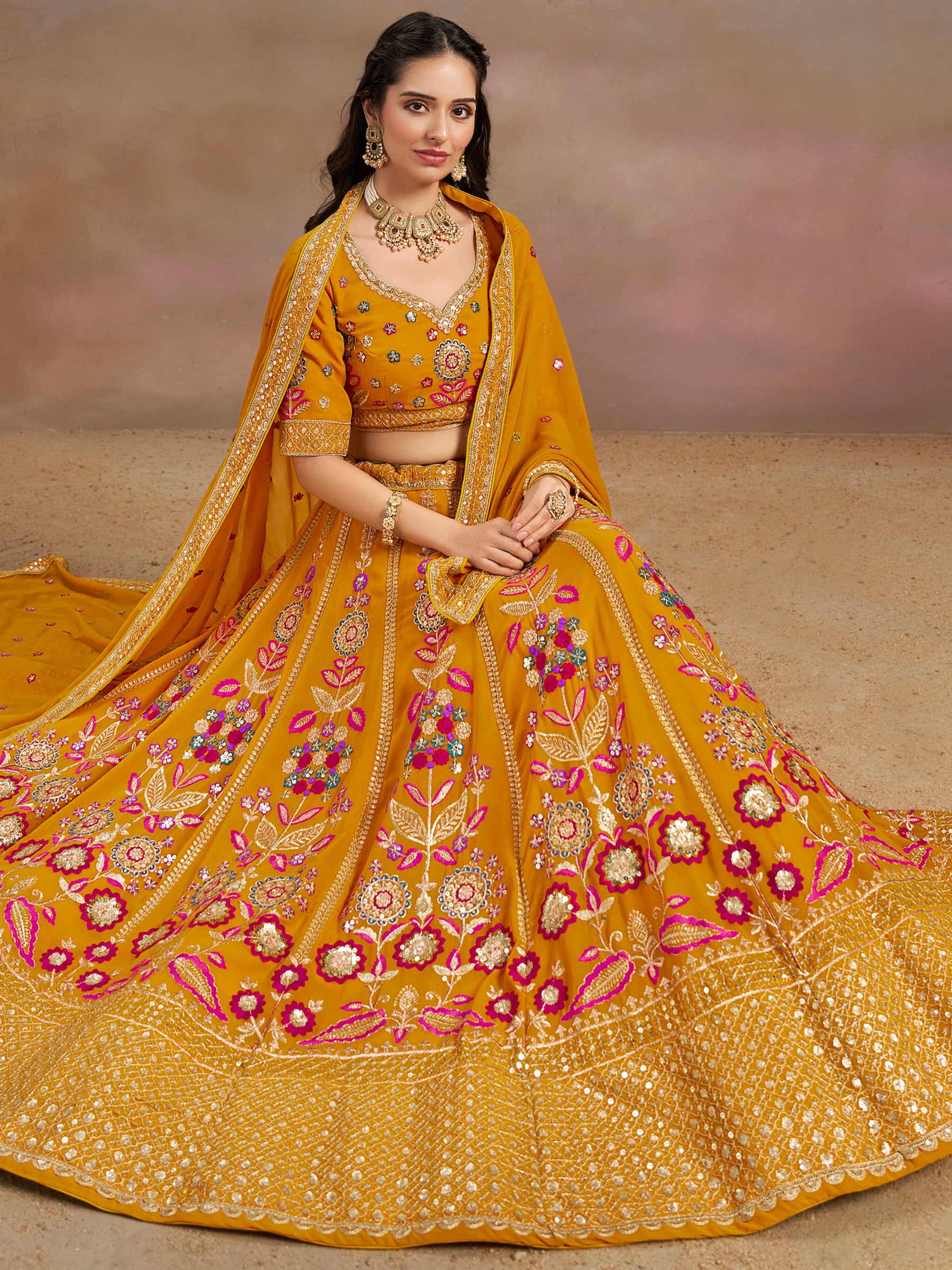 Pretty Yellow Thread Embroidered Georgette Haldi Wear Lehenga Choli