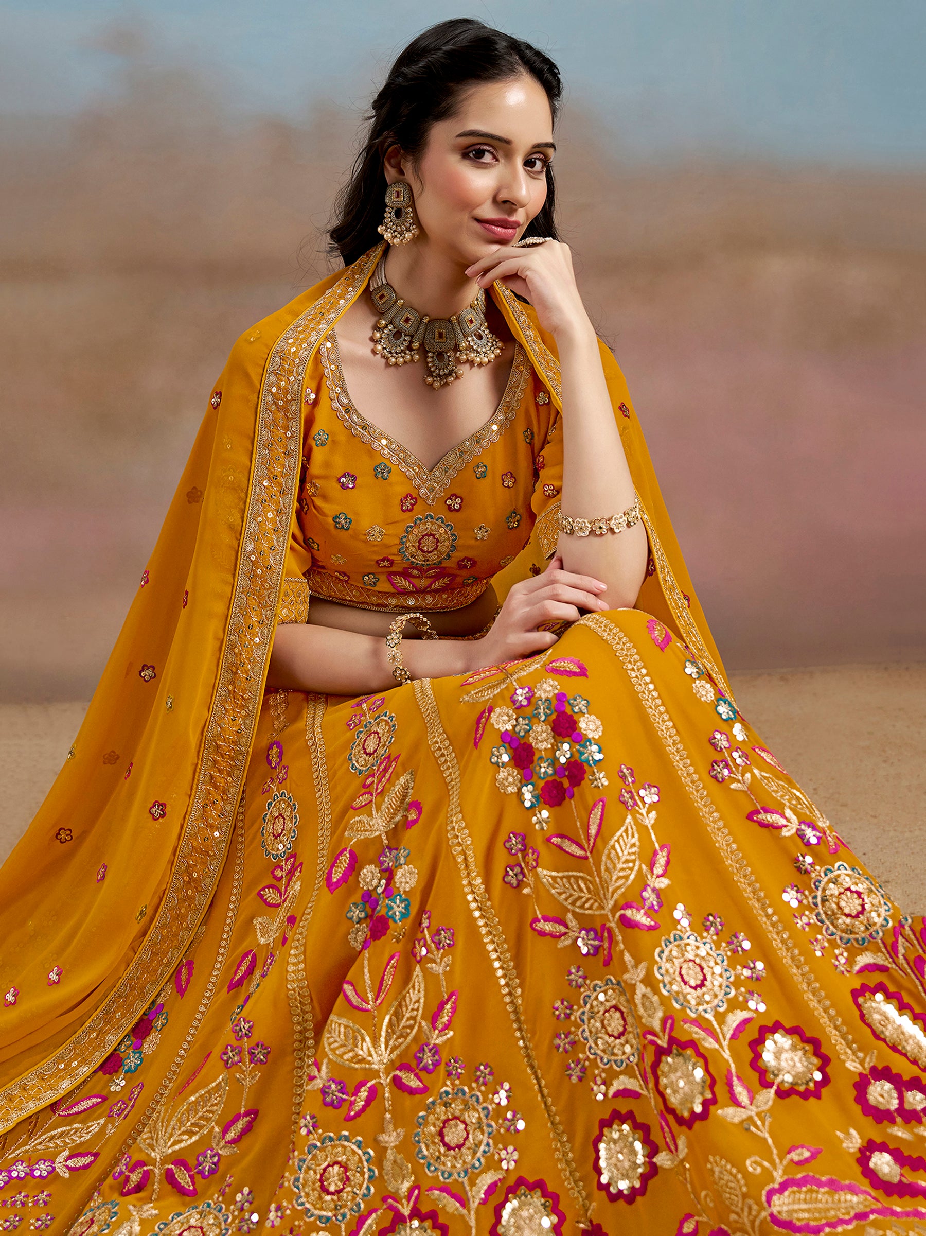 Pretty Yellow Thread Embroidered Georgette Haldi Wear Lehenga Choli
