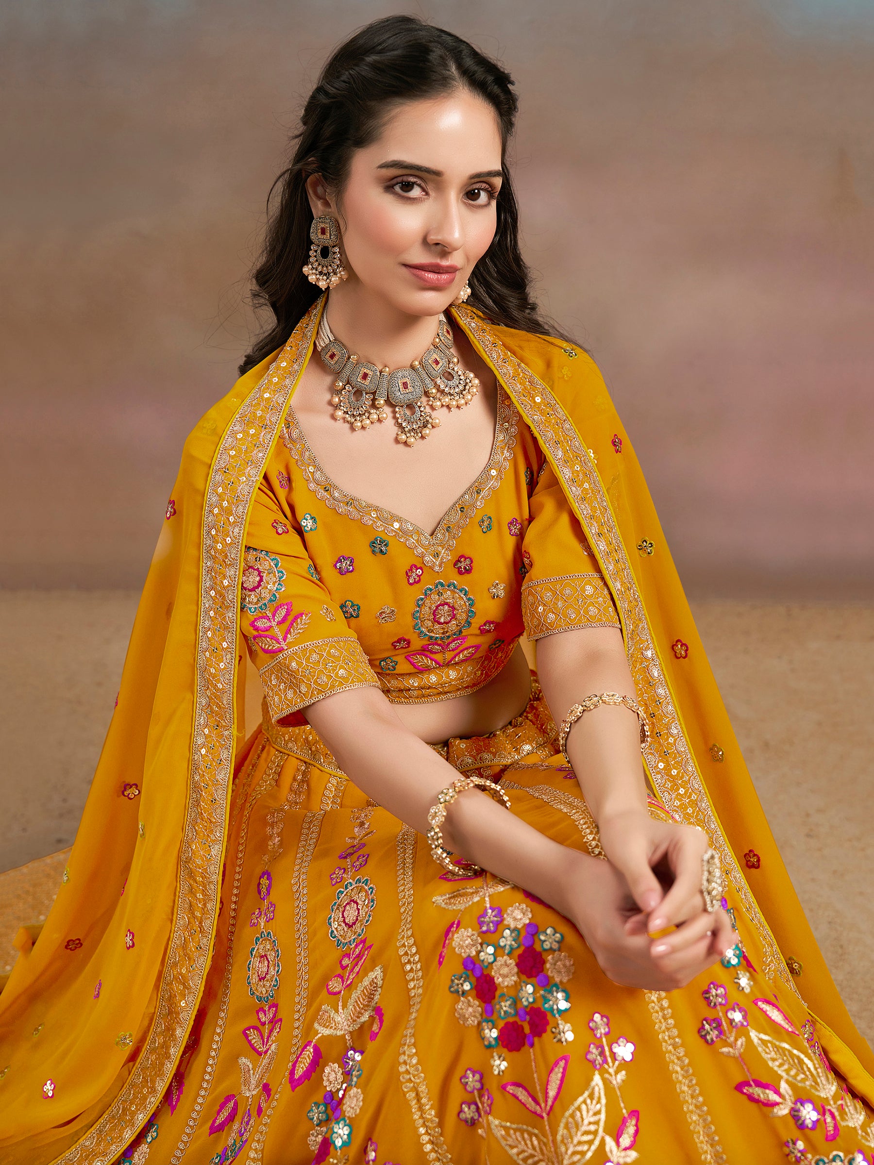 Pretty Yellow Thread Embroidered Georgette Haldi Wear Lehenga Choli