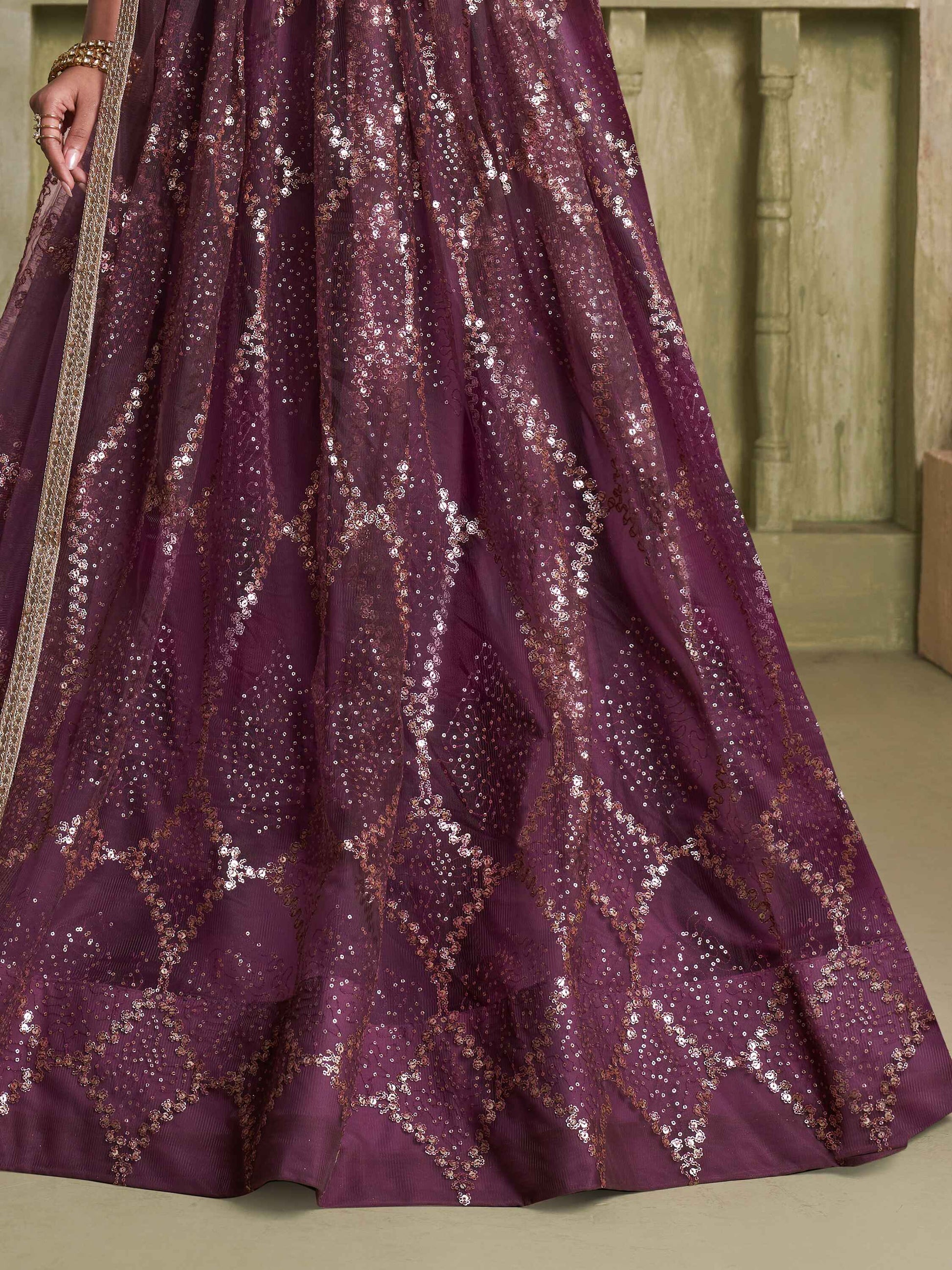 Attractive Wine Sequins Net Party Wear Lehenga Choli With Dupatta