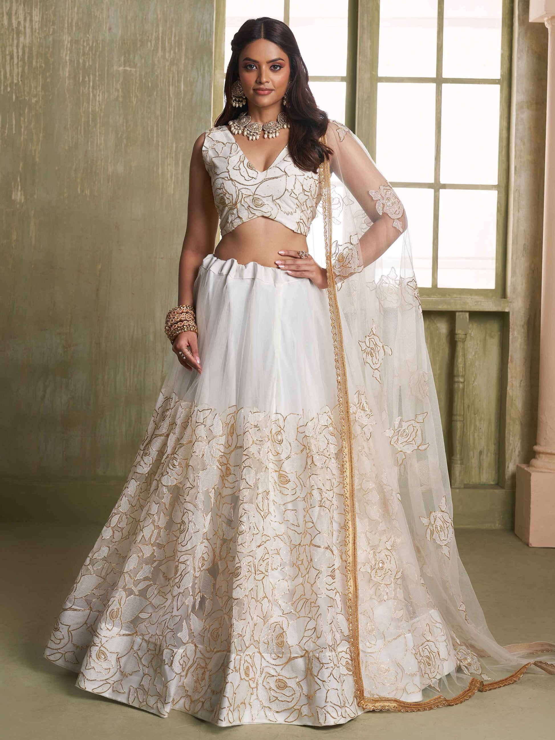 Amazing Off-White Embroidered Net Wedding Wear Lehenga Choli
