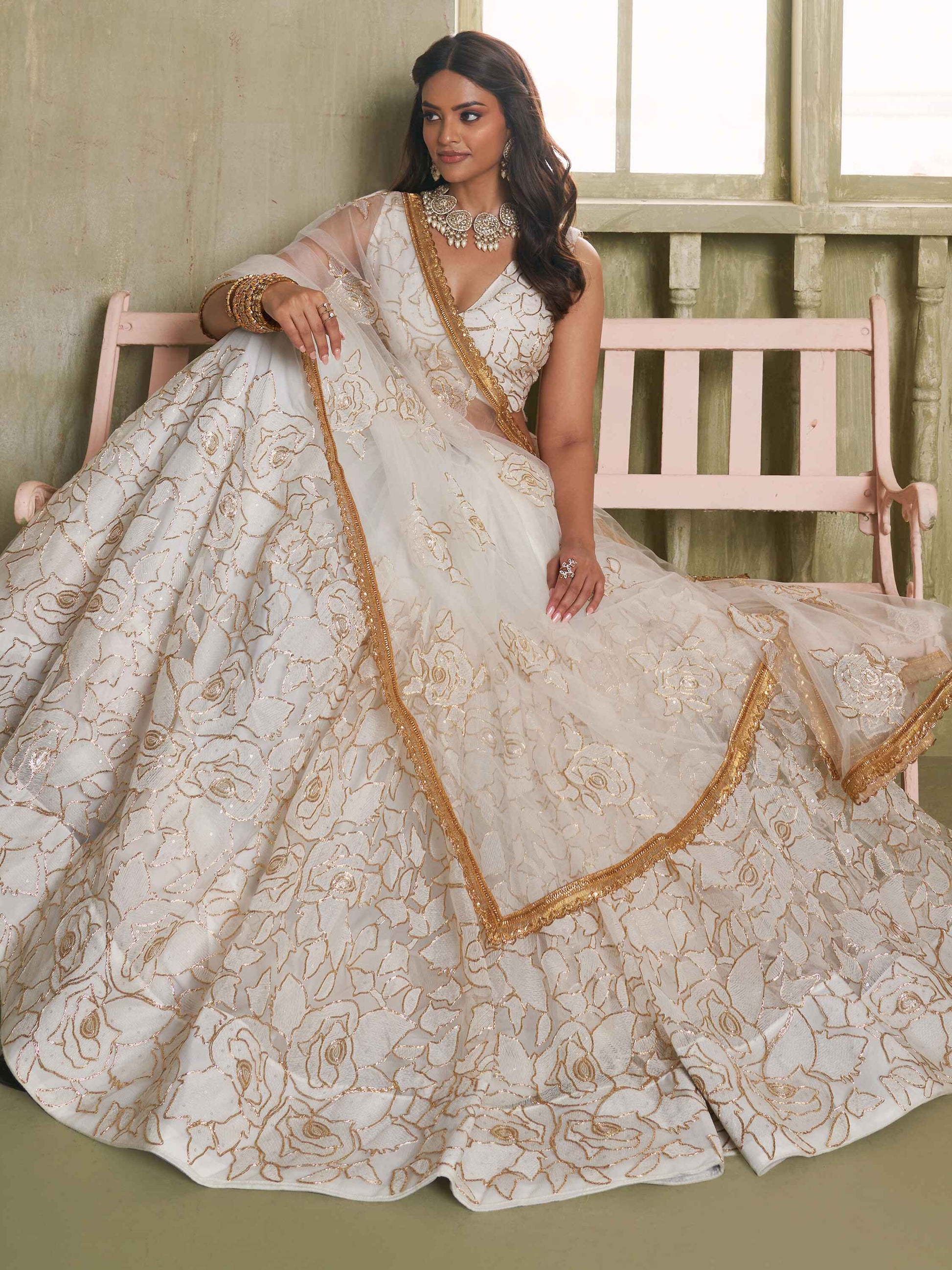 Amazing Off-White Embroidered Net Wedding Wear Lehenga Choli