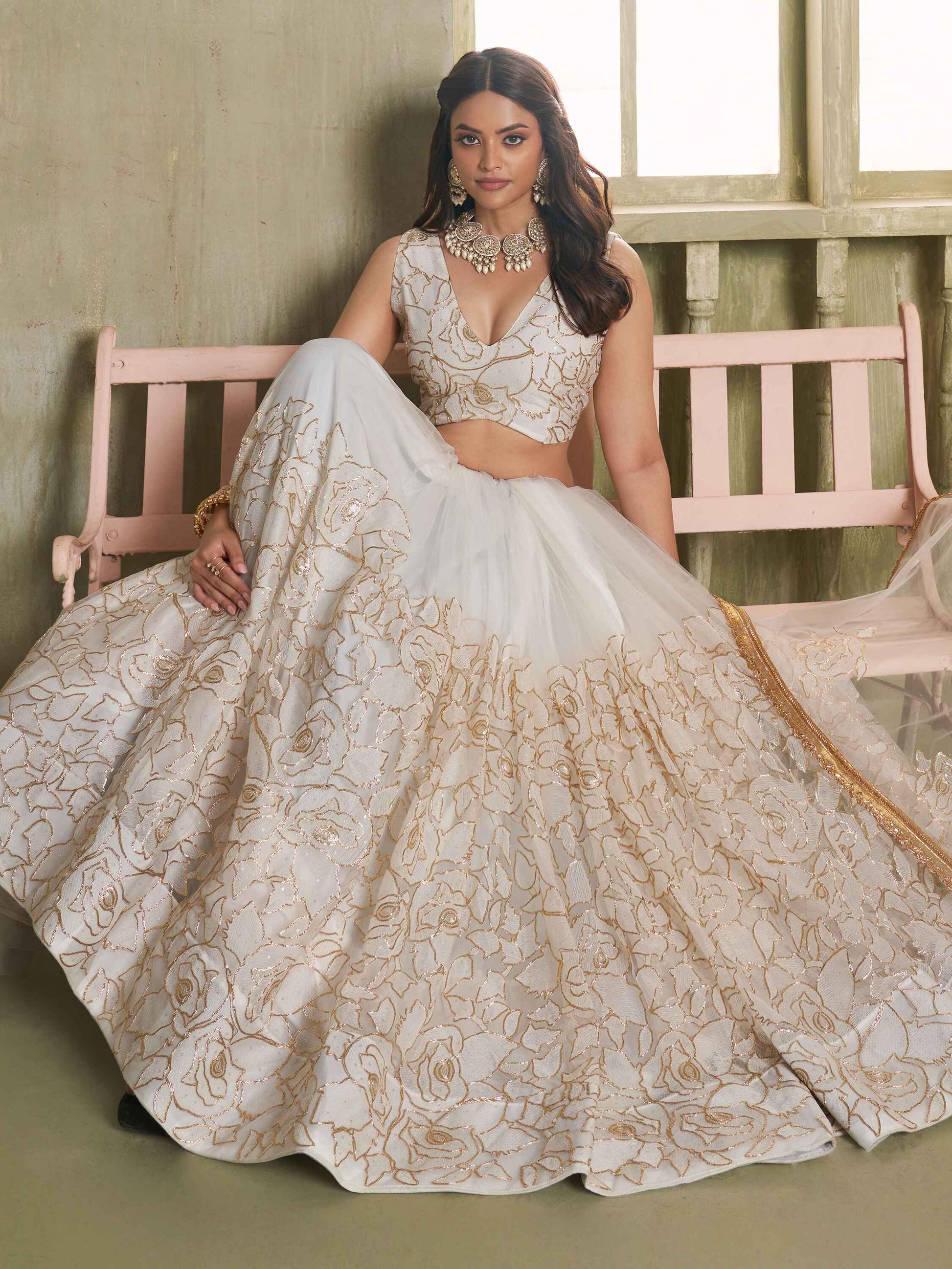 Amazing Off-White Embroidered Net Wedding Wear Lehenga Choli