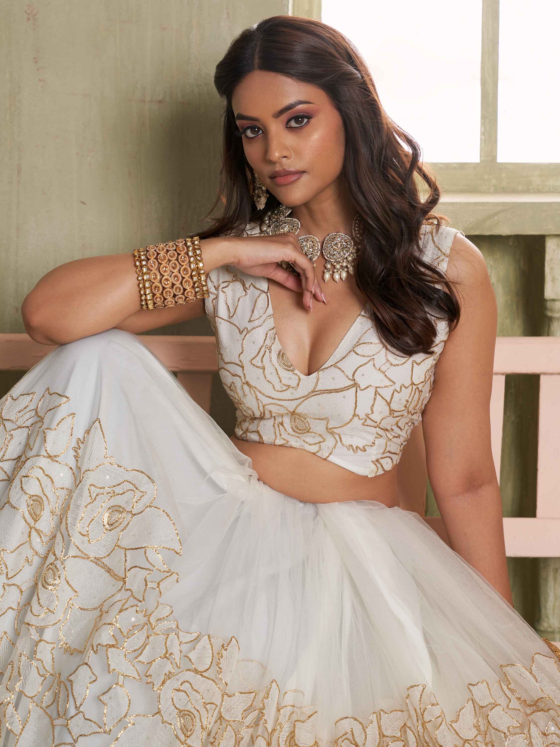 Amazing Off-White Embroidered Net Wedding Wear Lehenga Choli