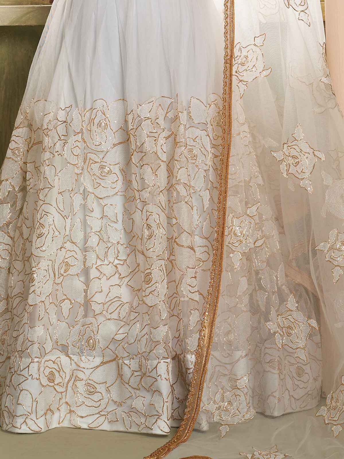 Amazing Off-White Embroidered Net Wedding Wear Lehenga Choli