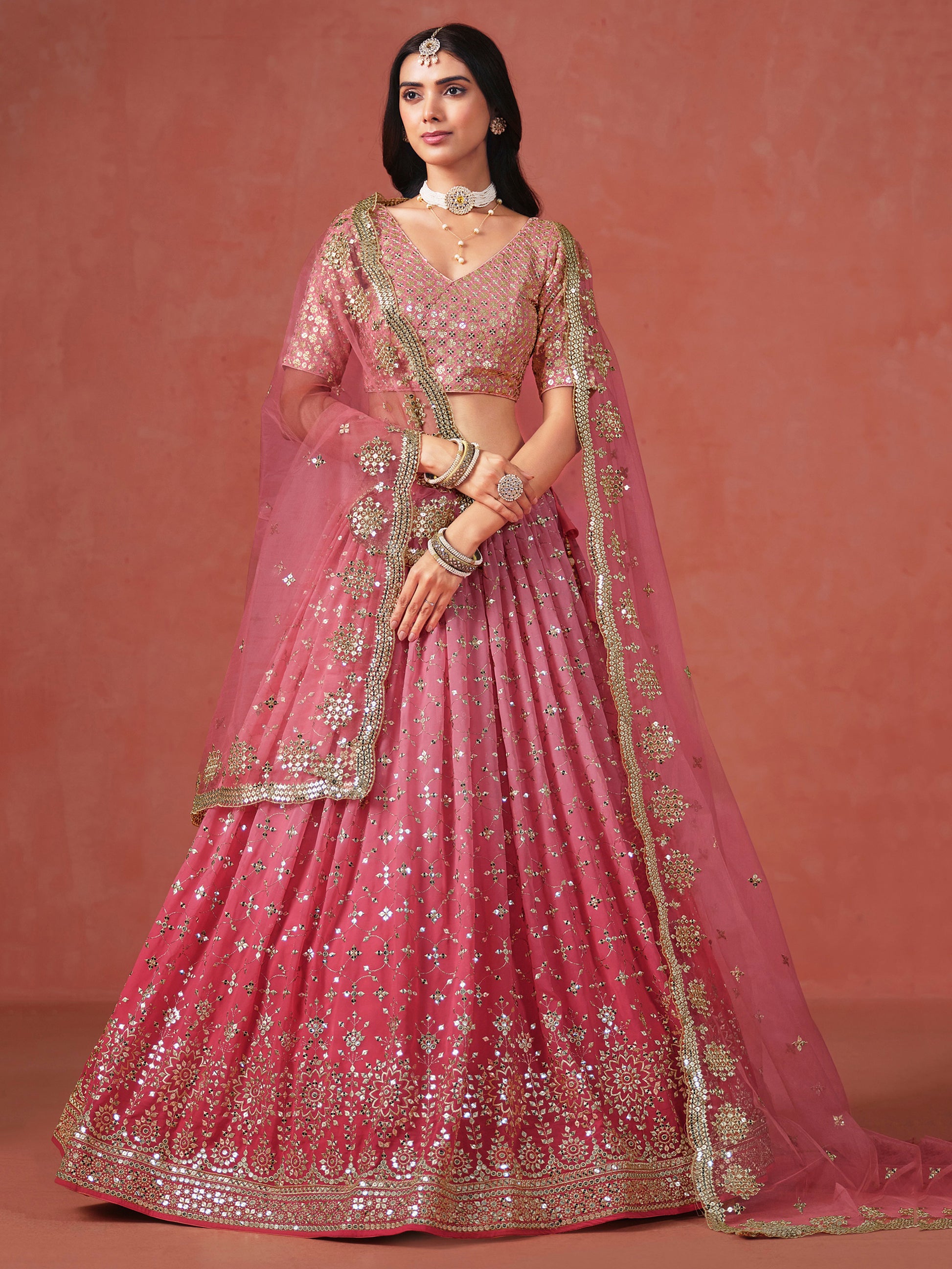 Fabulous Peach Georgette Embroidered Zari Lehenga Choli With Dupatta