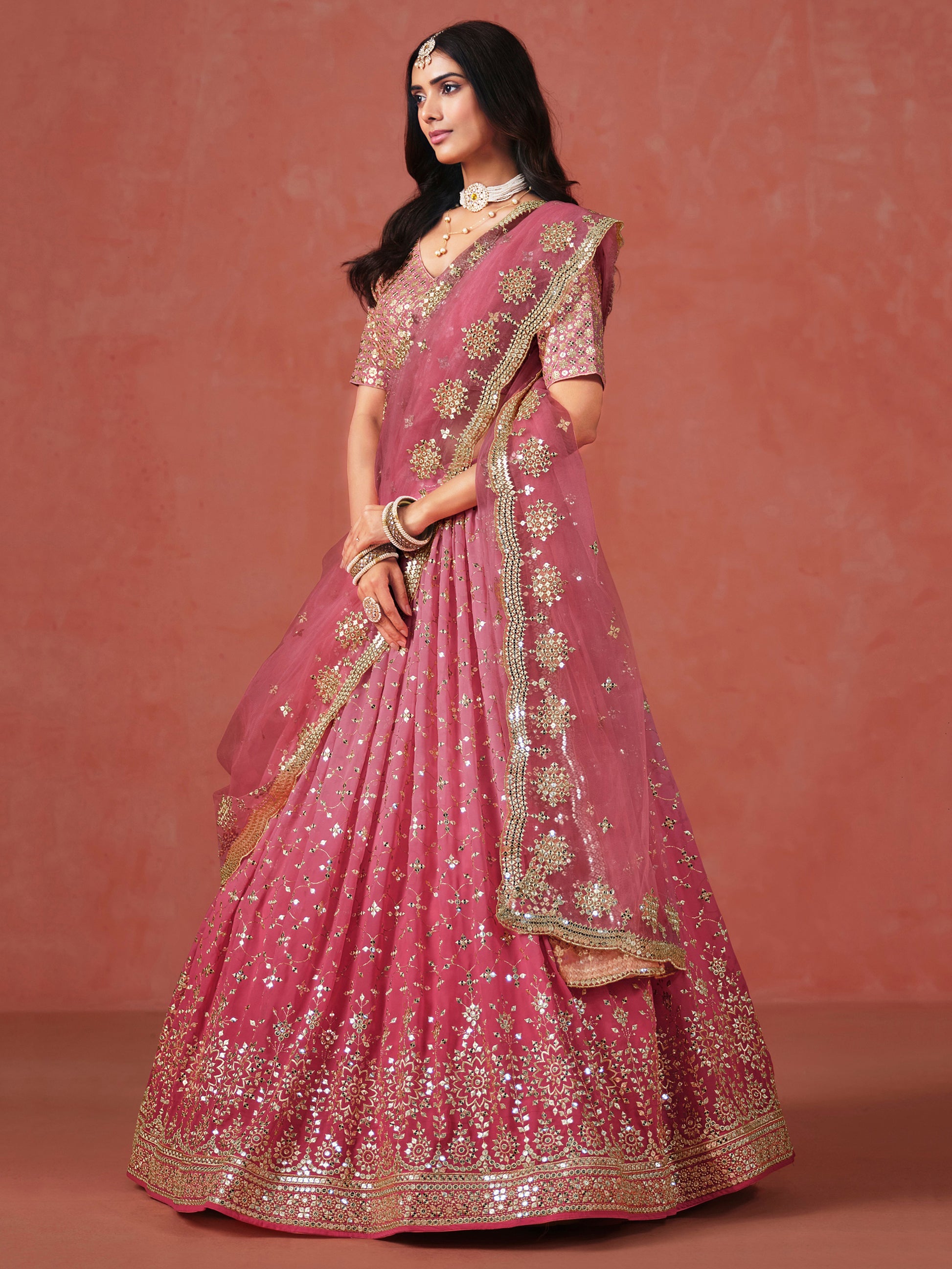 Fabulous Peach Georgette Embroidered Zari Lehenga Choli With Dupatta