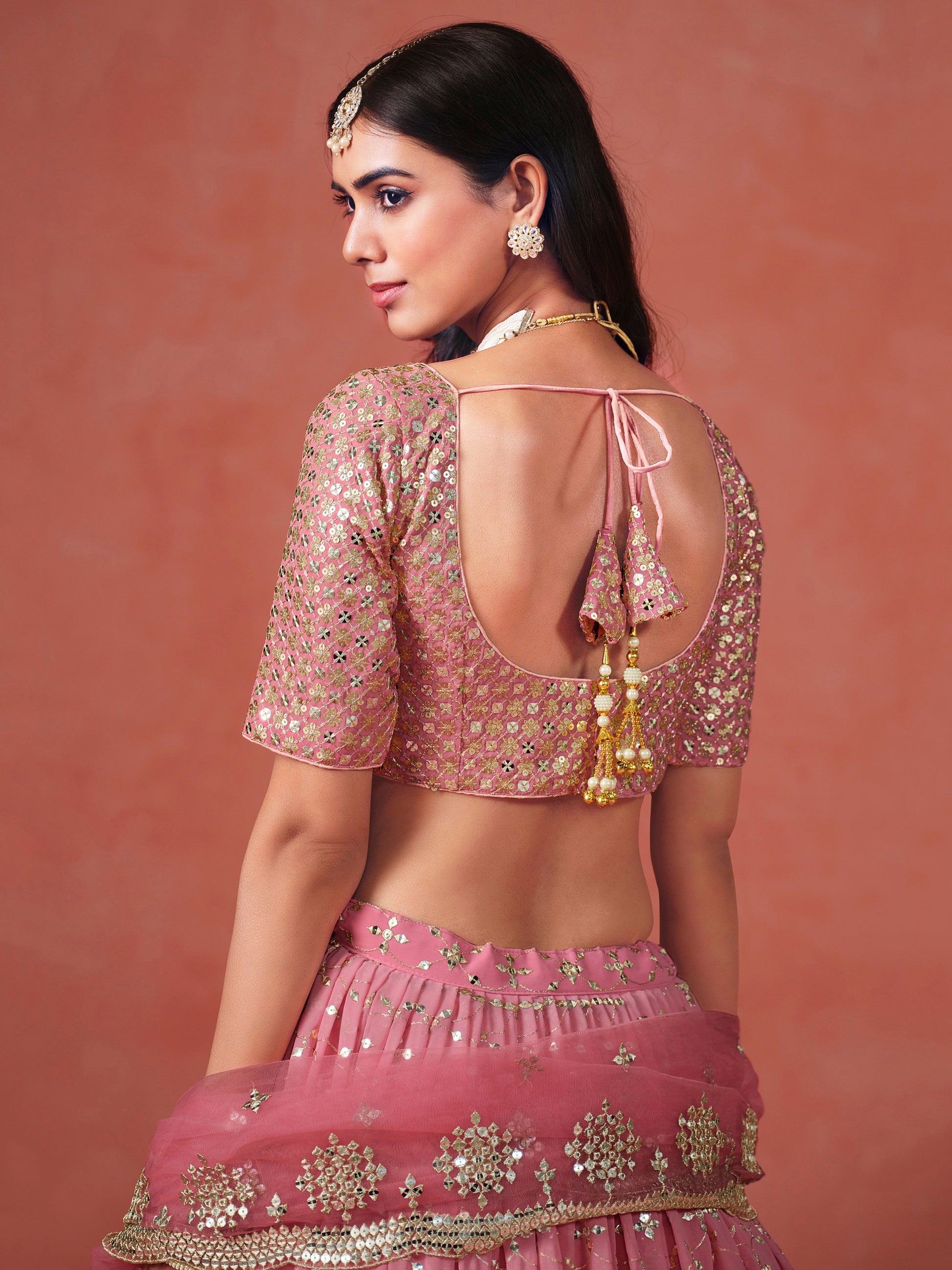 Fabulous Peach Georgette Embroidered Zari Lehenga Choli With Dupatta