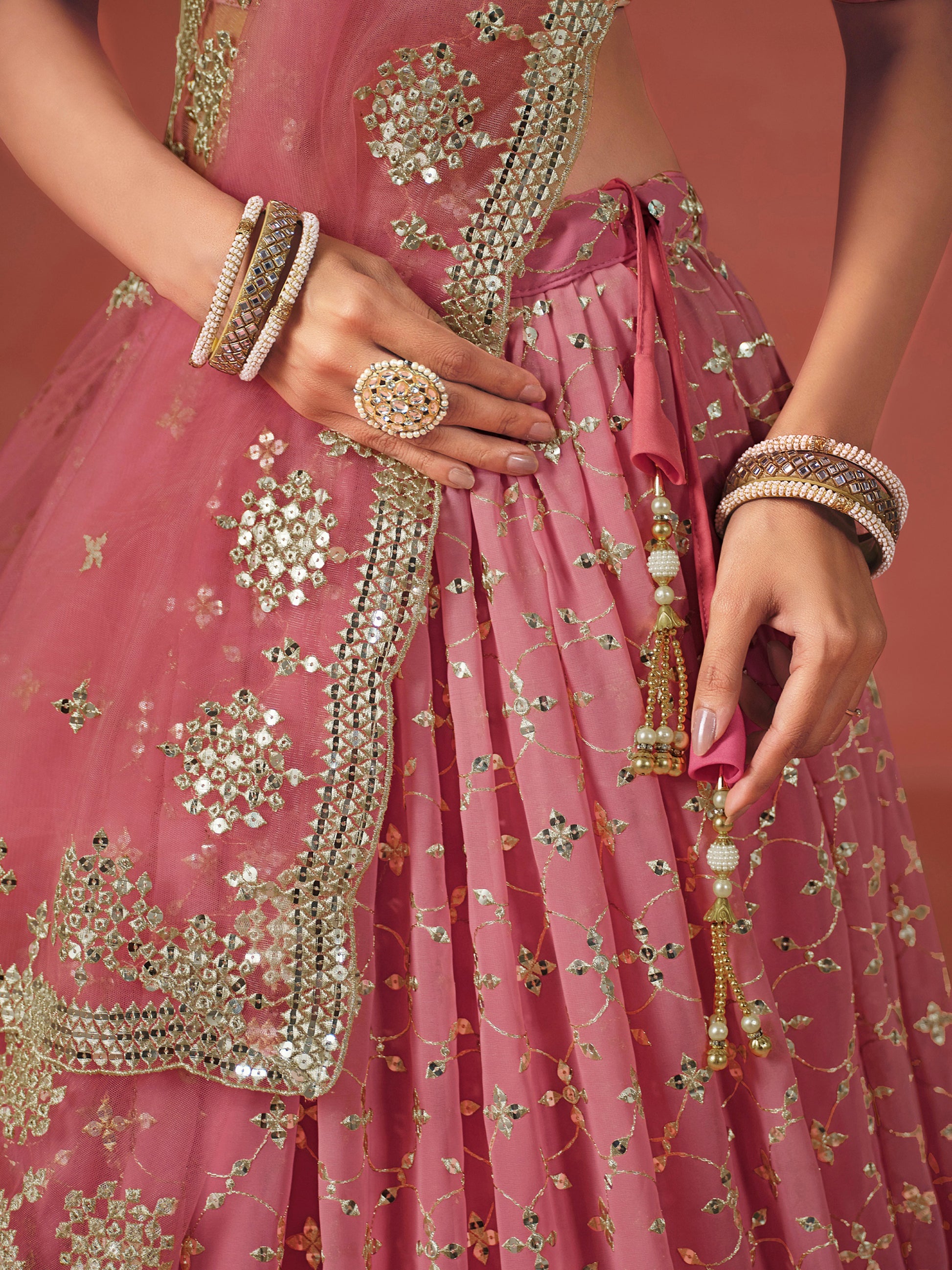 Fabulous Peach Georgette Embroidered Zari Lehenga Choli With Dupatta