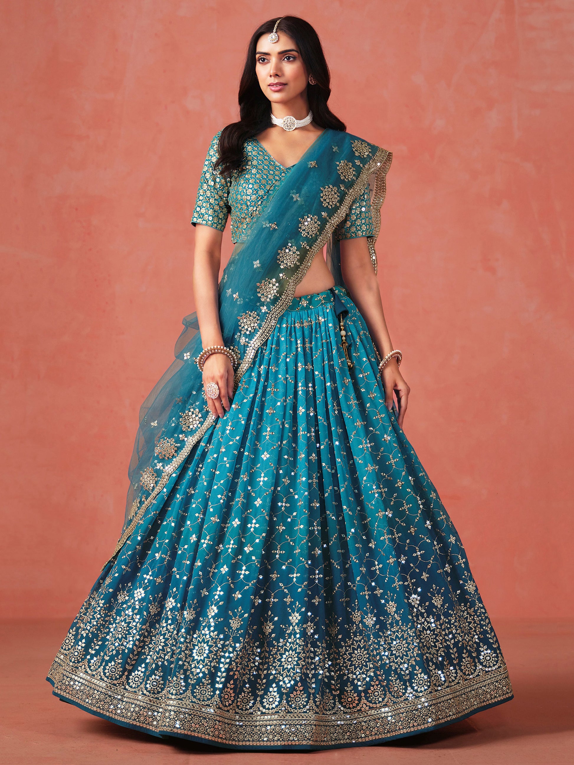 Charming Teal Blue Sequins Work Georgette Lehenga Choli