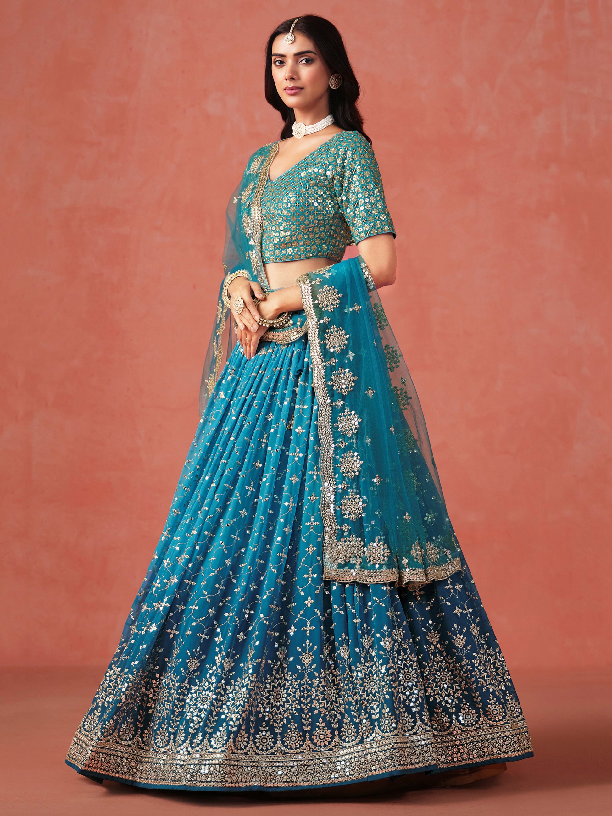 Charming Teal Blue Sequins Work Georgette Lehenga Choli