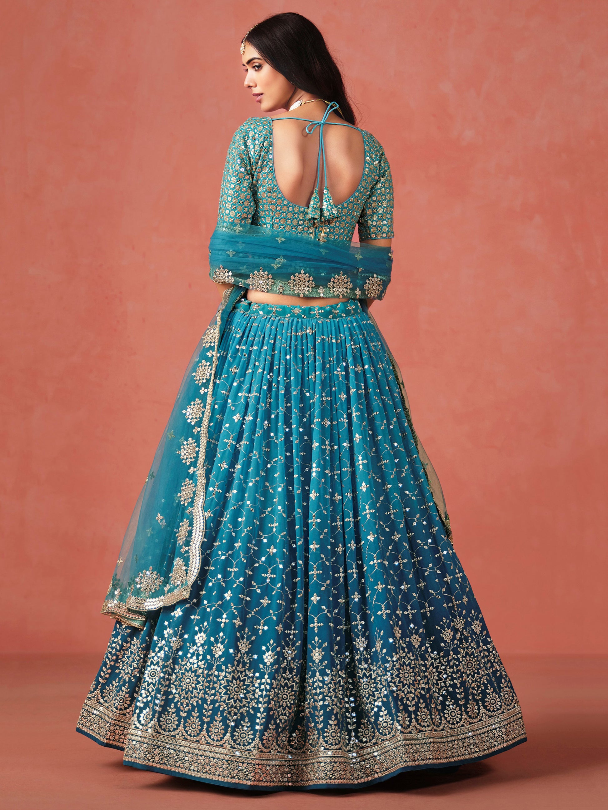 Charming Teal Blue Sequins Work Georgette Lehenga Choli