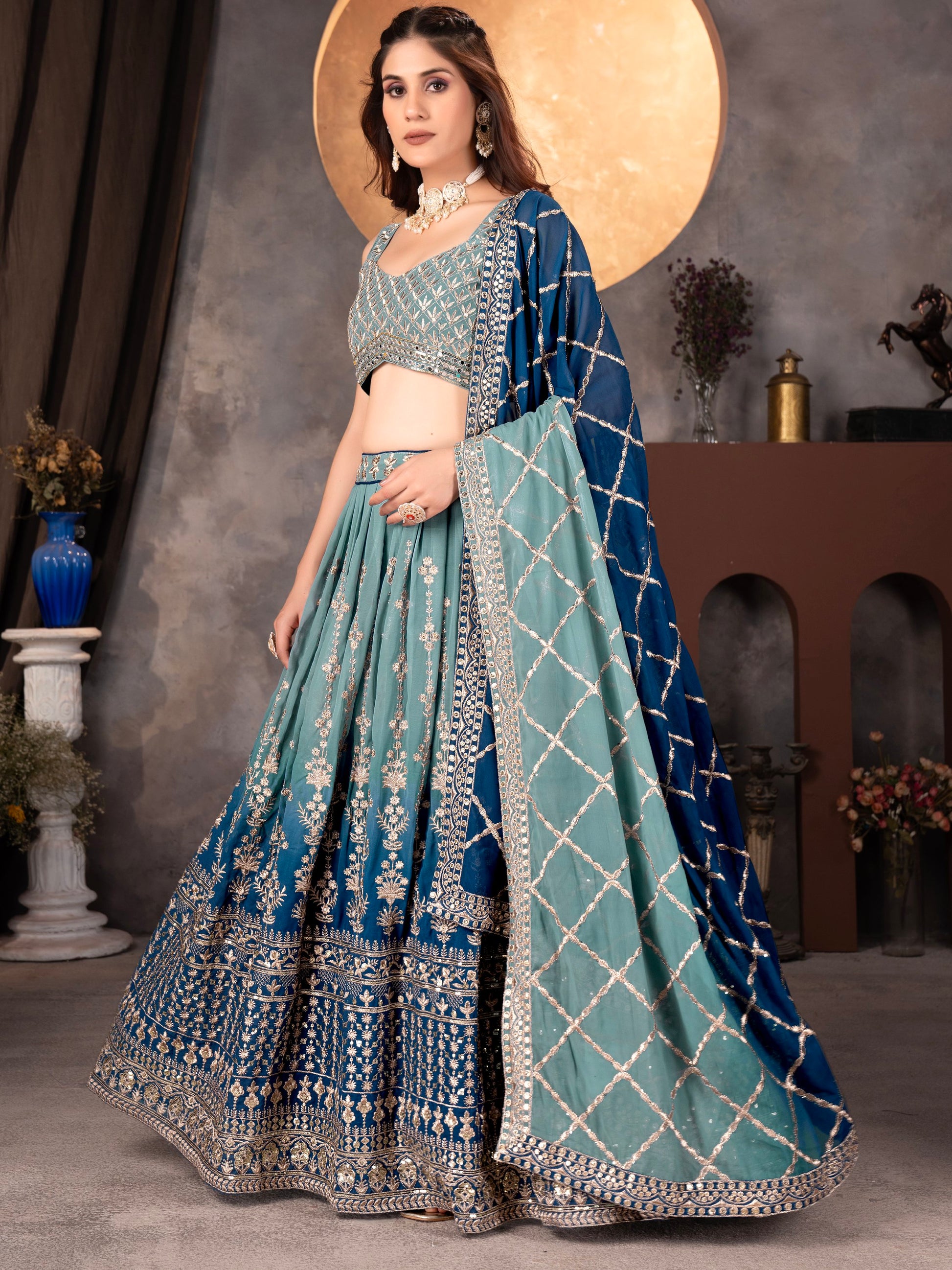 Dreamy Light Blue Sequins Georgette Wedding Wear Lehenga Choli With Dupatta