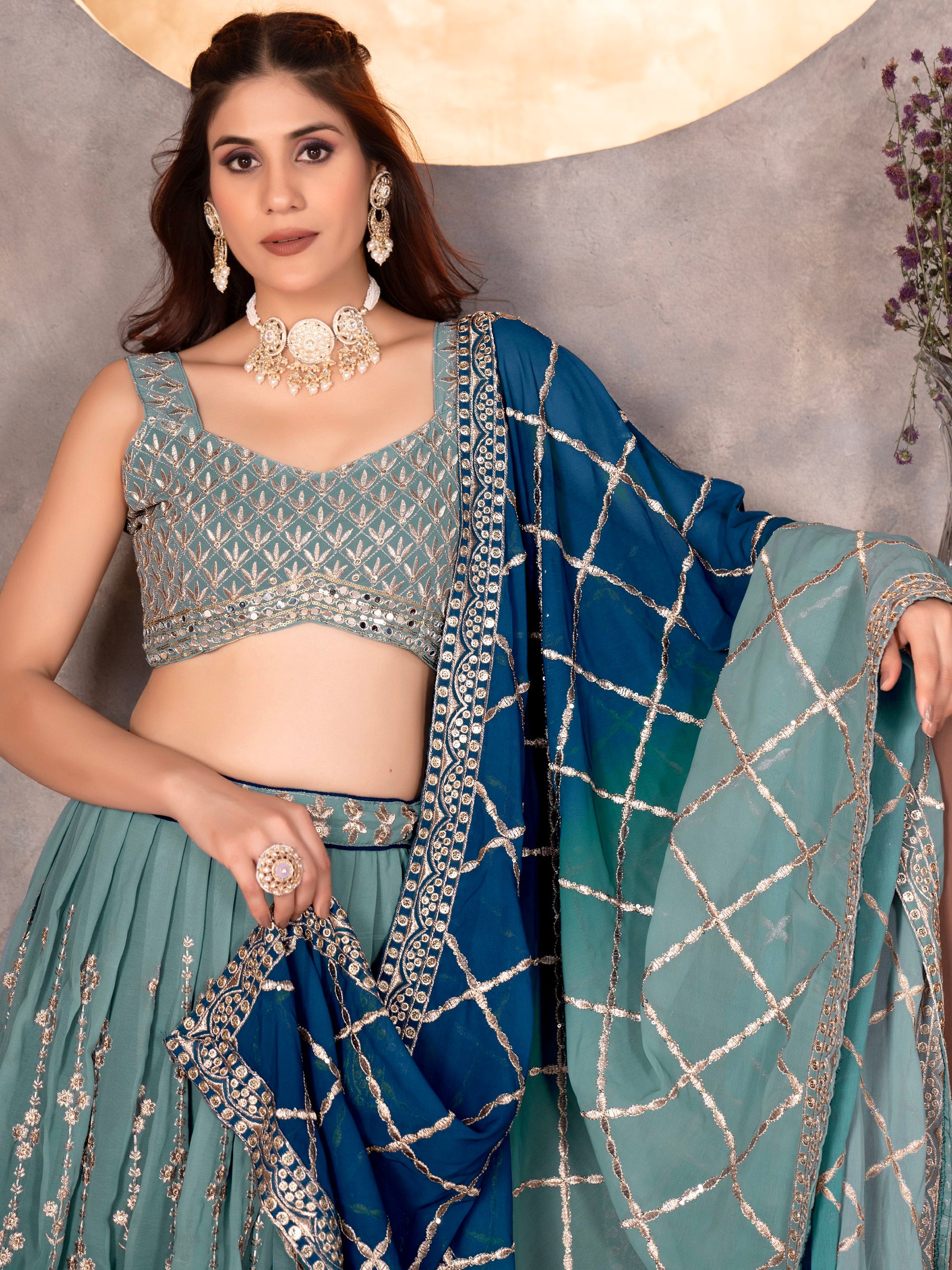 Dreamy Light Blue Sequins Georgette Wedding Wear Lehenga Choli With Dupatta