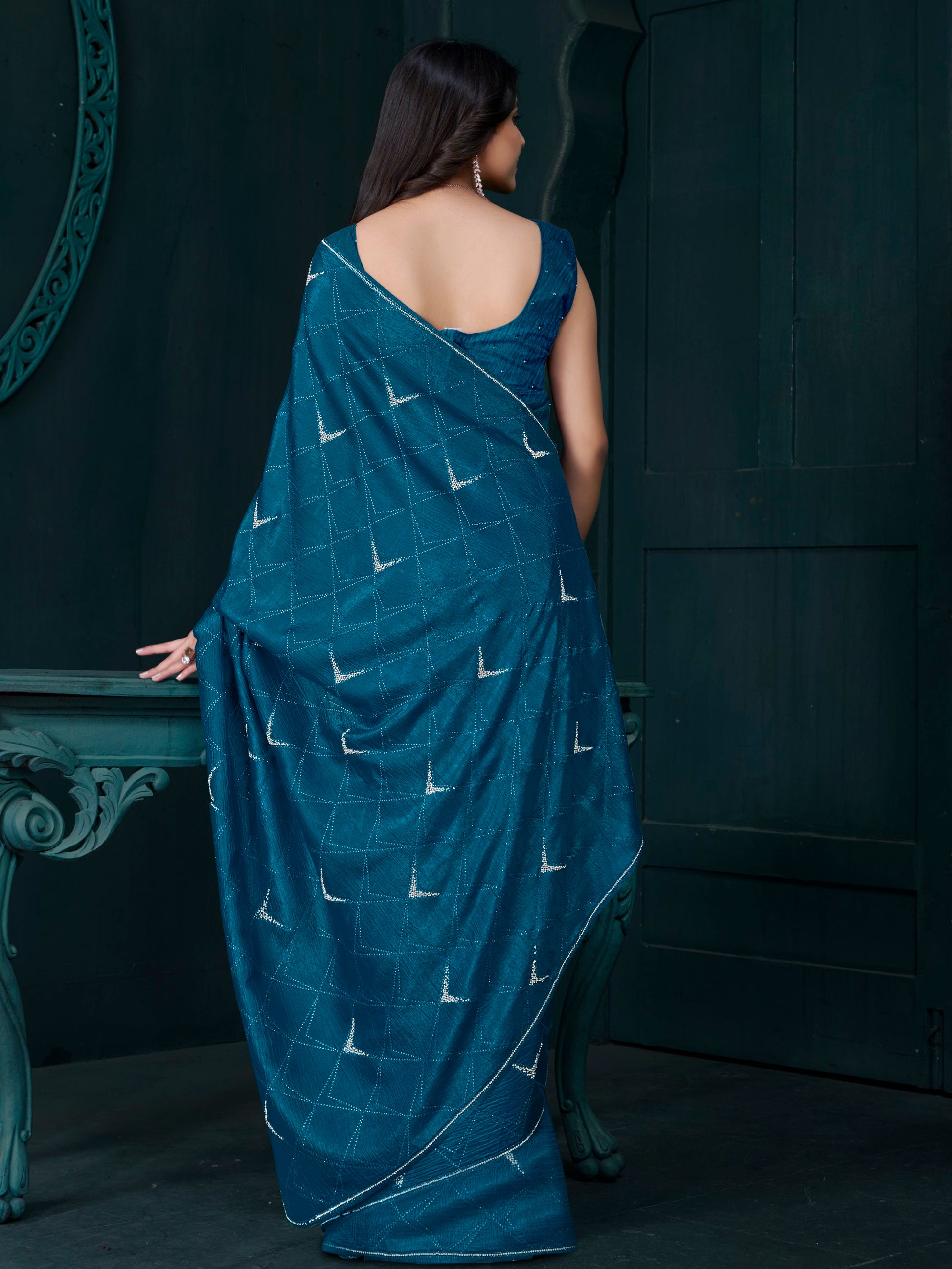 Fascinating Teal Blue Crepe Silk Party Wear Saree With Blouse
