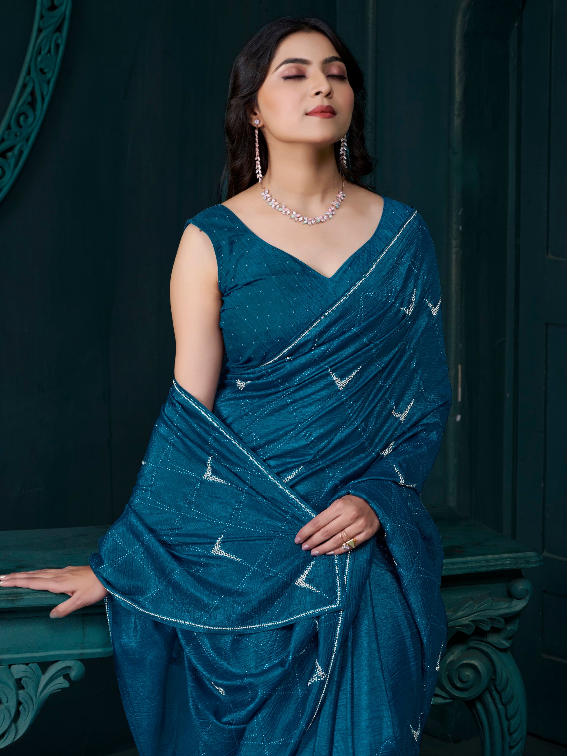 Fascinating Teal Blue Crepe Silk Party Wear Saree With Blouse