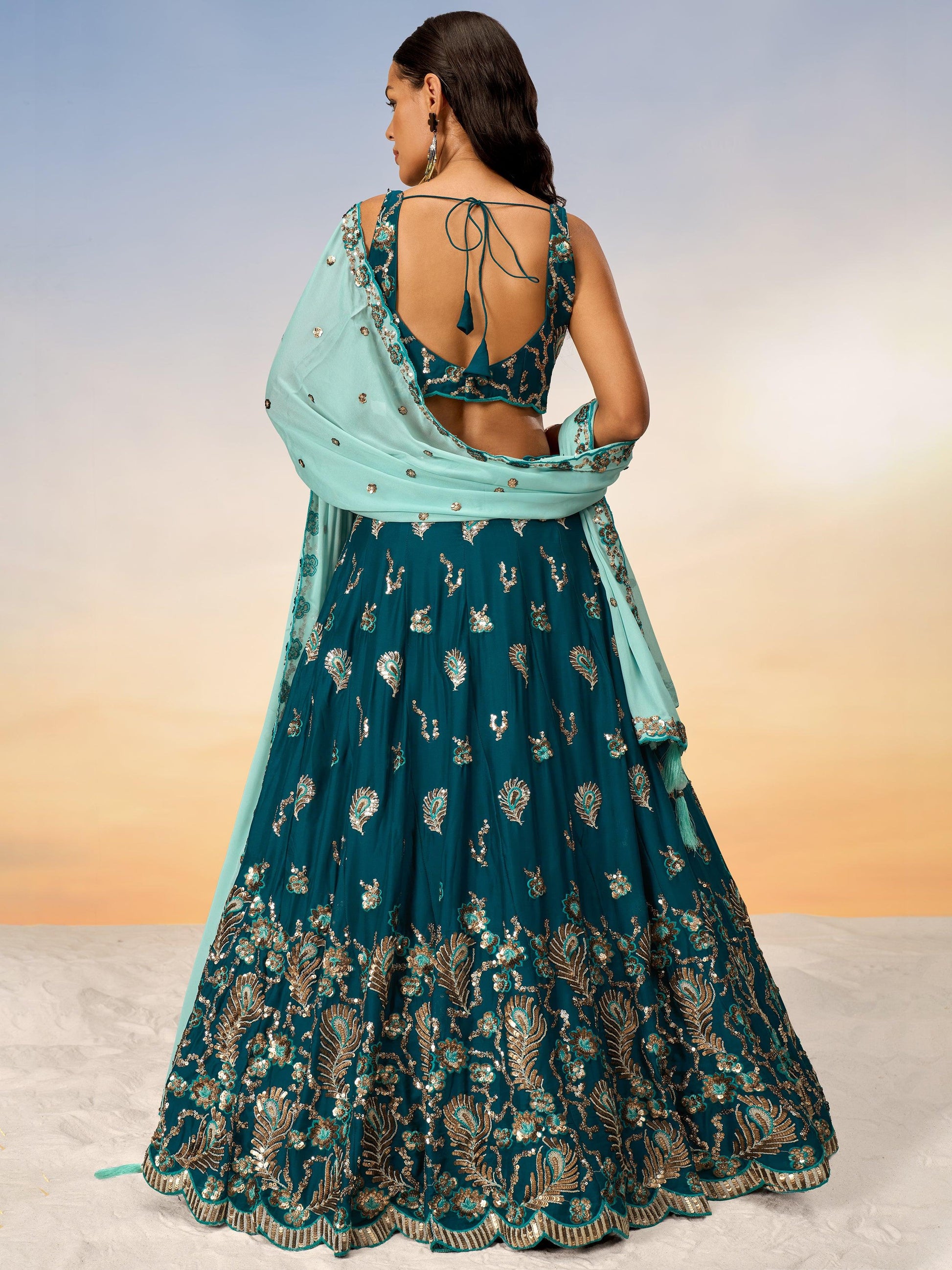 Alluring Teal Green Sequins Georgette Sangeet Wear Lehenga Choli