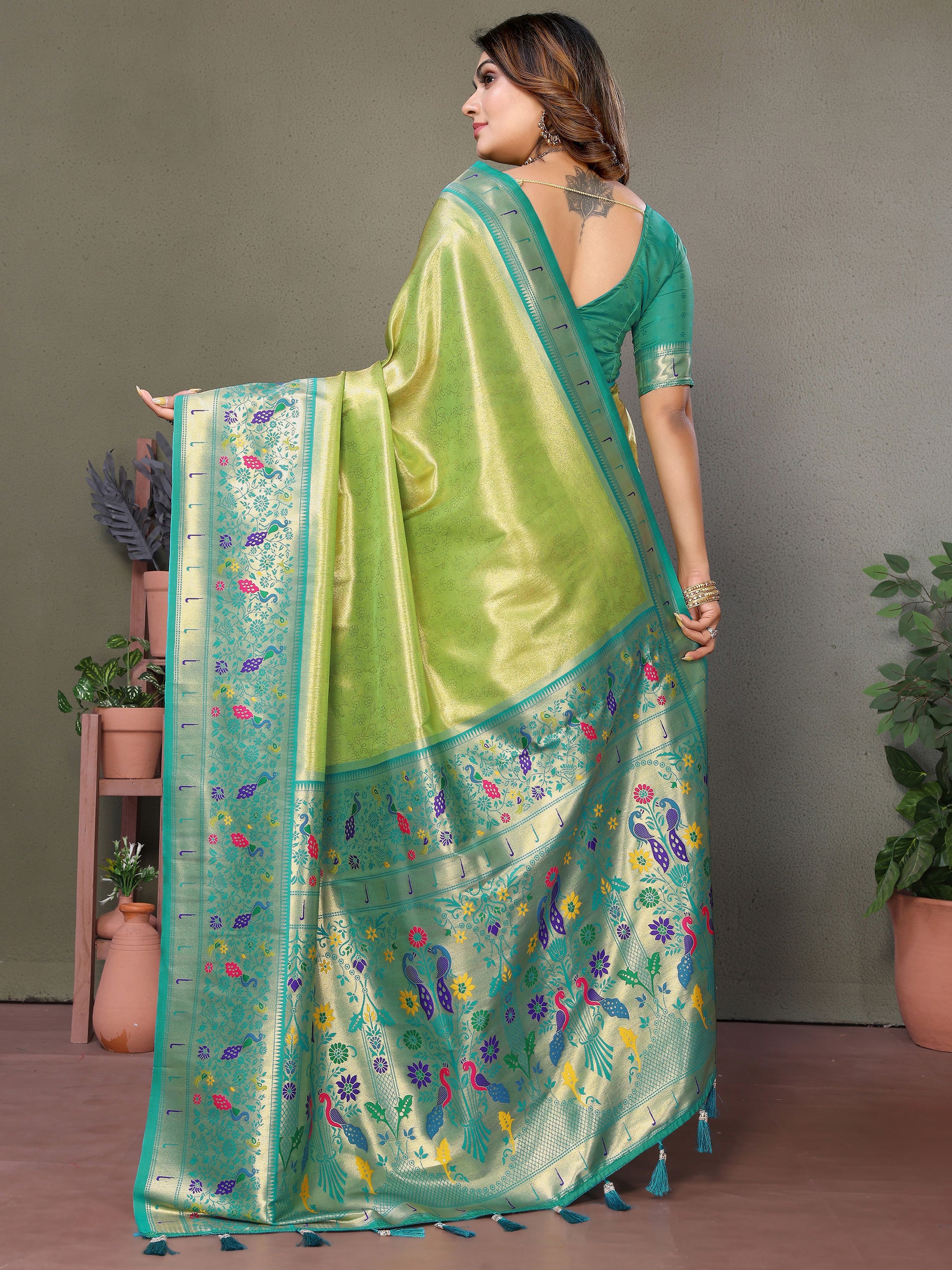 Spectacular Olive Green Zari Weaving Banarasi Silk Traditional Wear Saree
