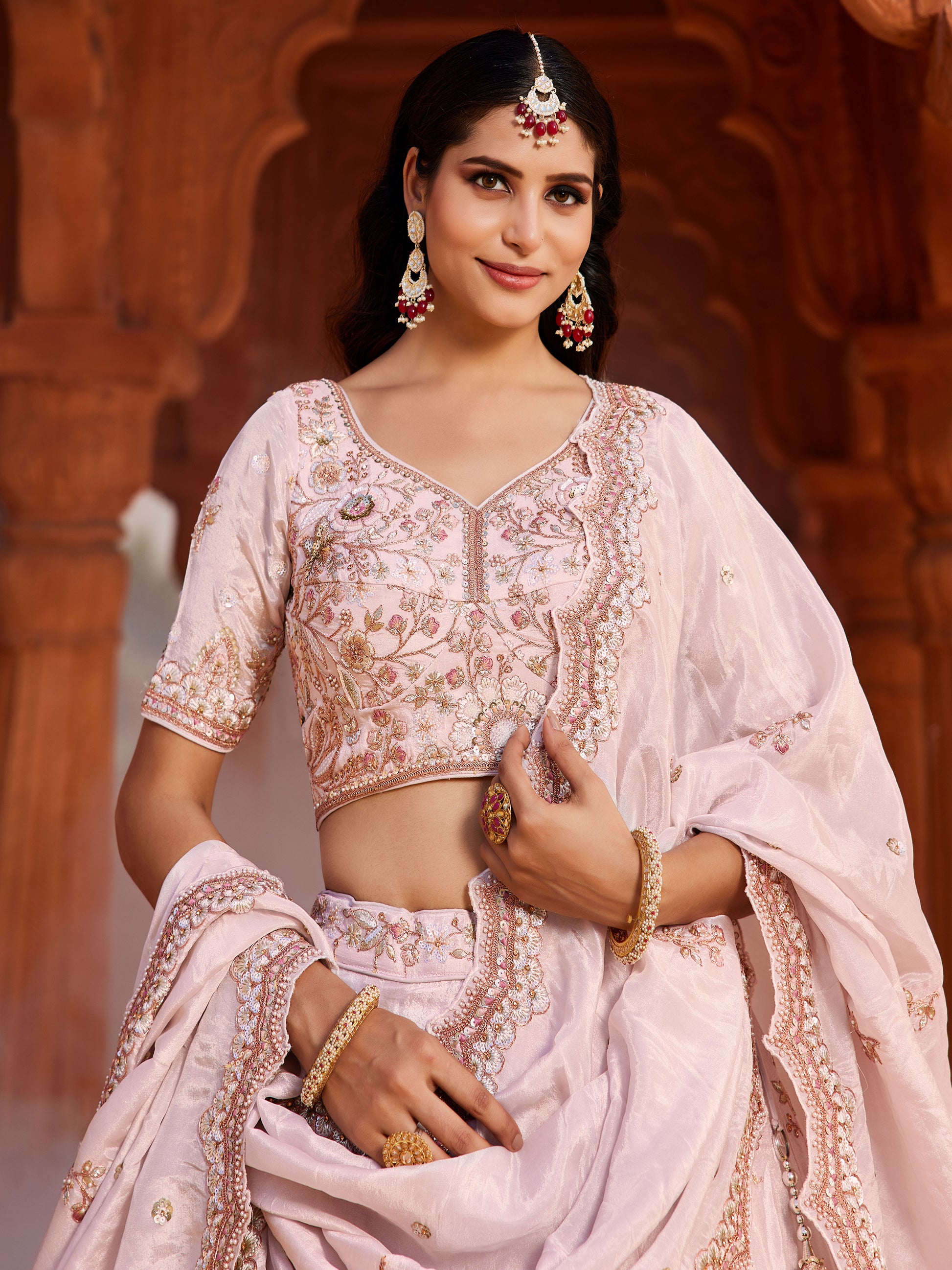 Astonishing Coral Pink Thread Embroidered Tissue Silk Engagement Wear Lehenga Choli
