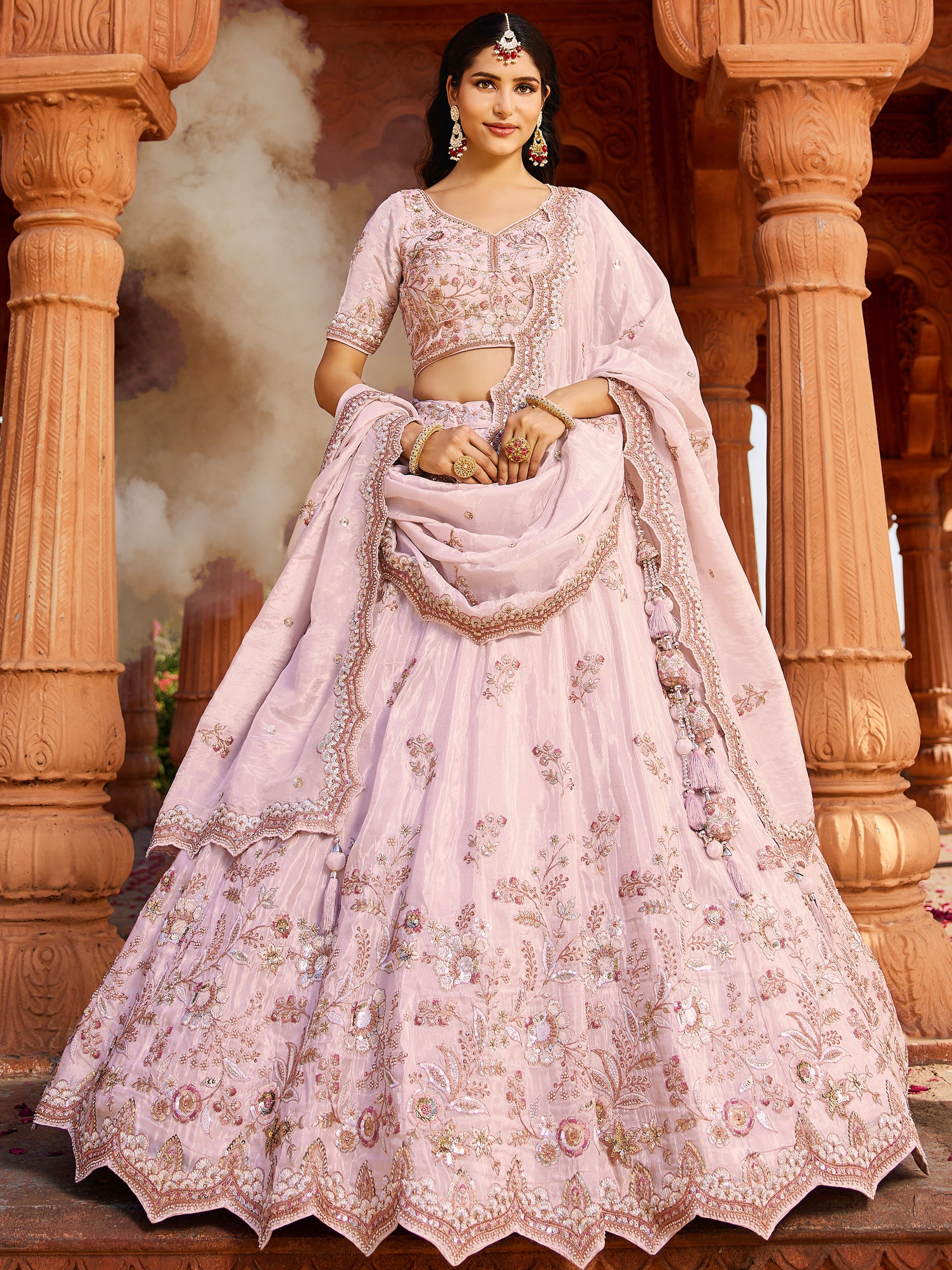 Astonishing Coral Pink Thread Embroidered Tissue Silk Engagement Wear Lehenga Choli