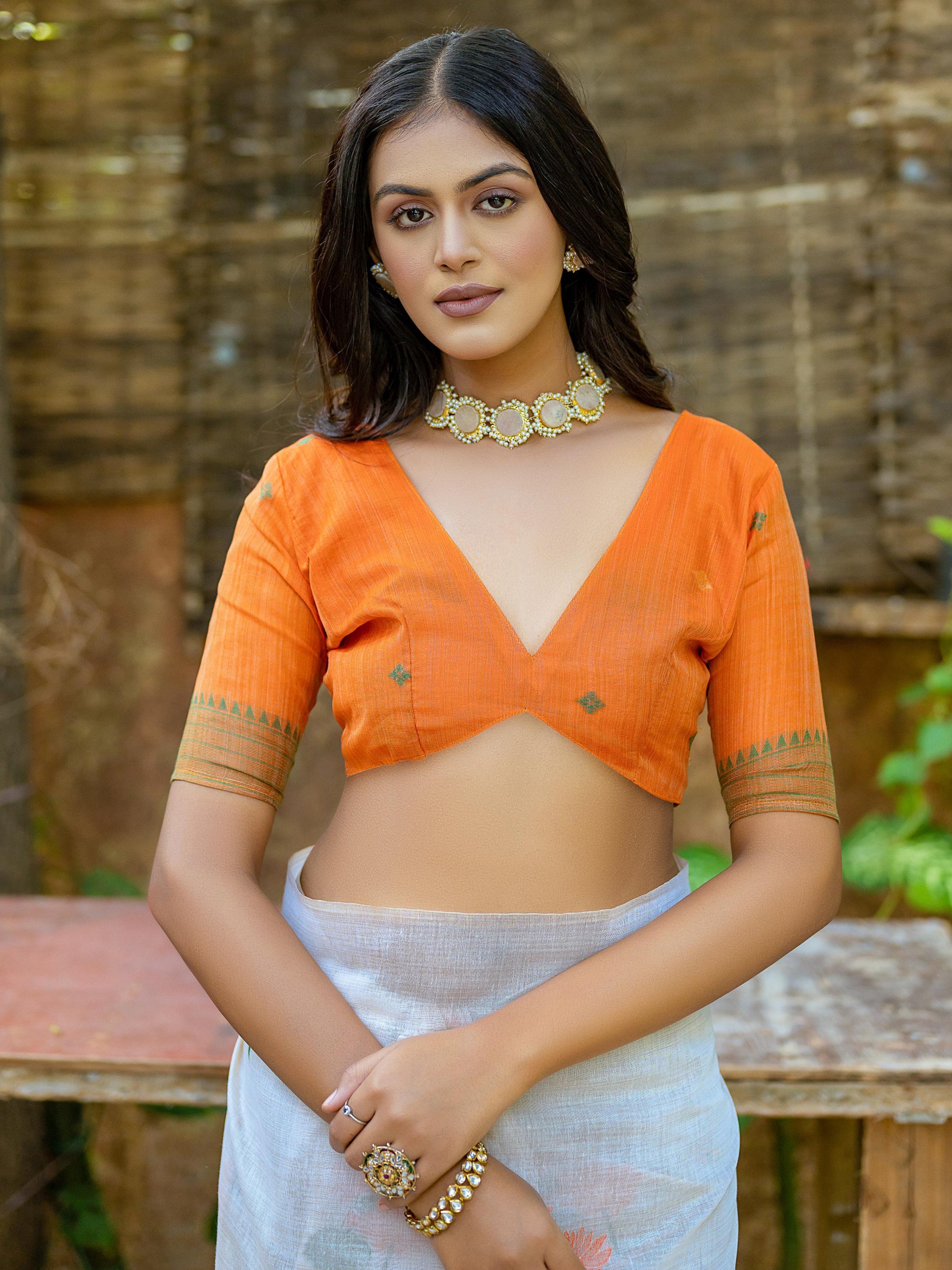 Pretty Off-White Floral Printed Cotton Casual Wear Saree With Orange Blouse