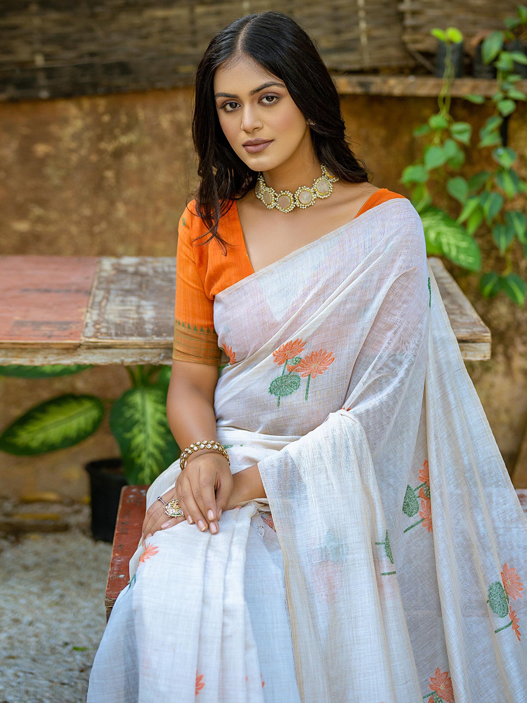 Pretty Off-White Floral Printed Cotton Casual Wear Saree With Orange Blouse