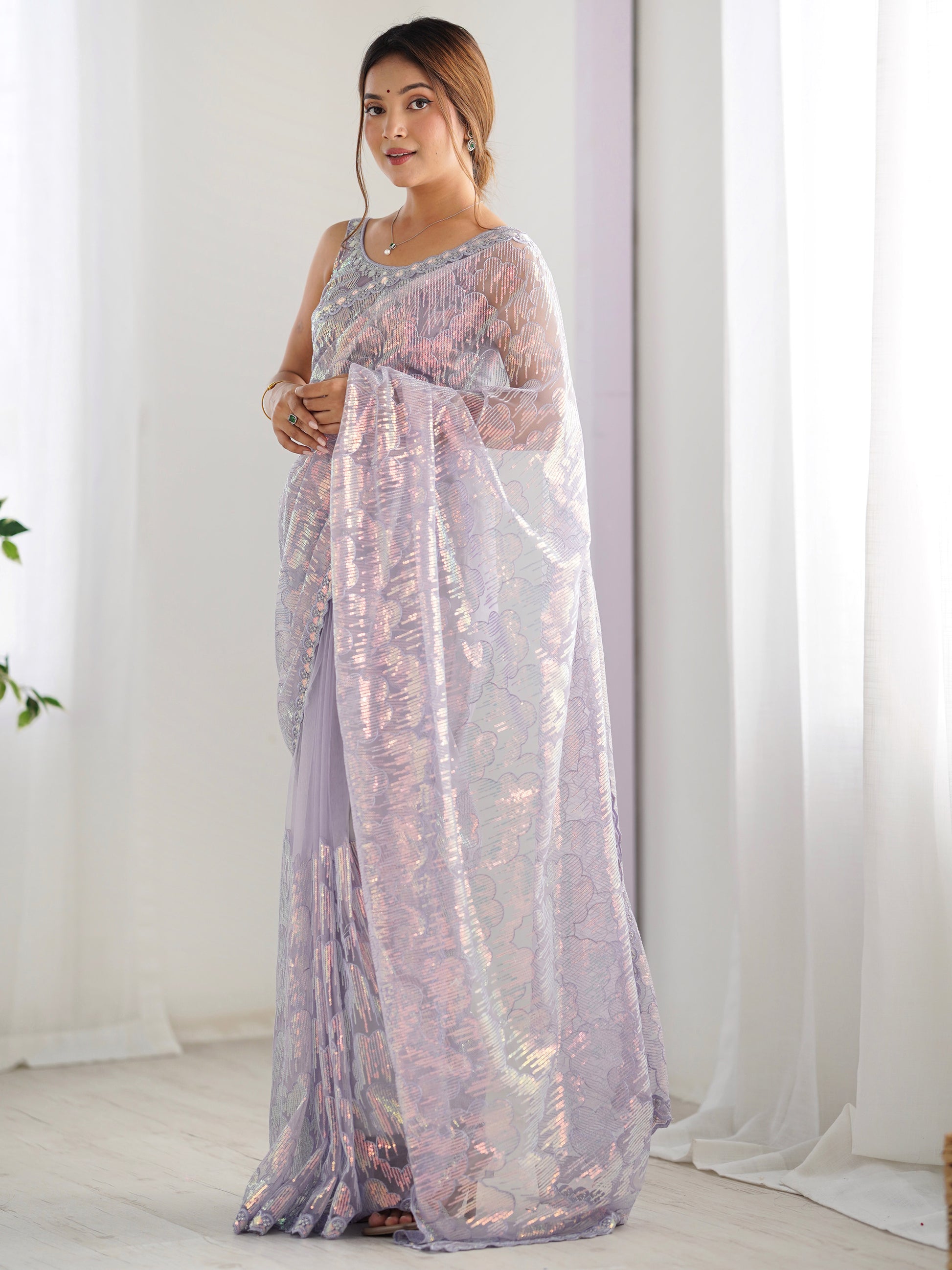 Charming Lavender Sequins Net Party Wear Saree With Blouse