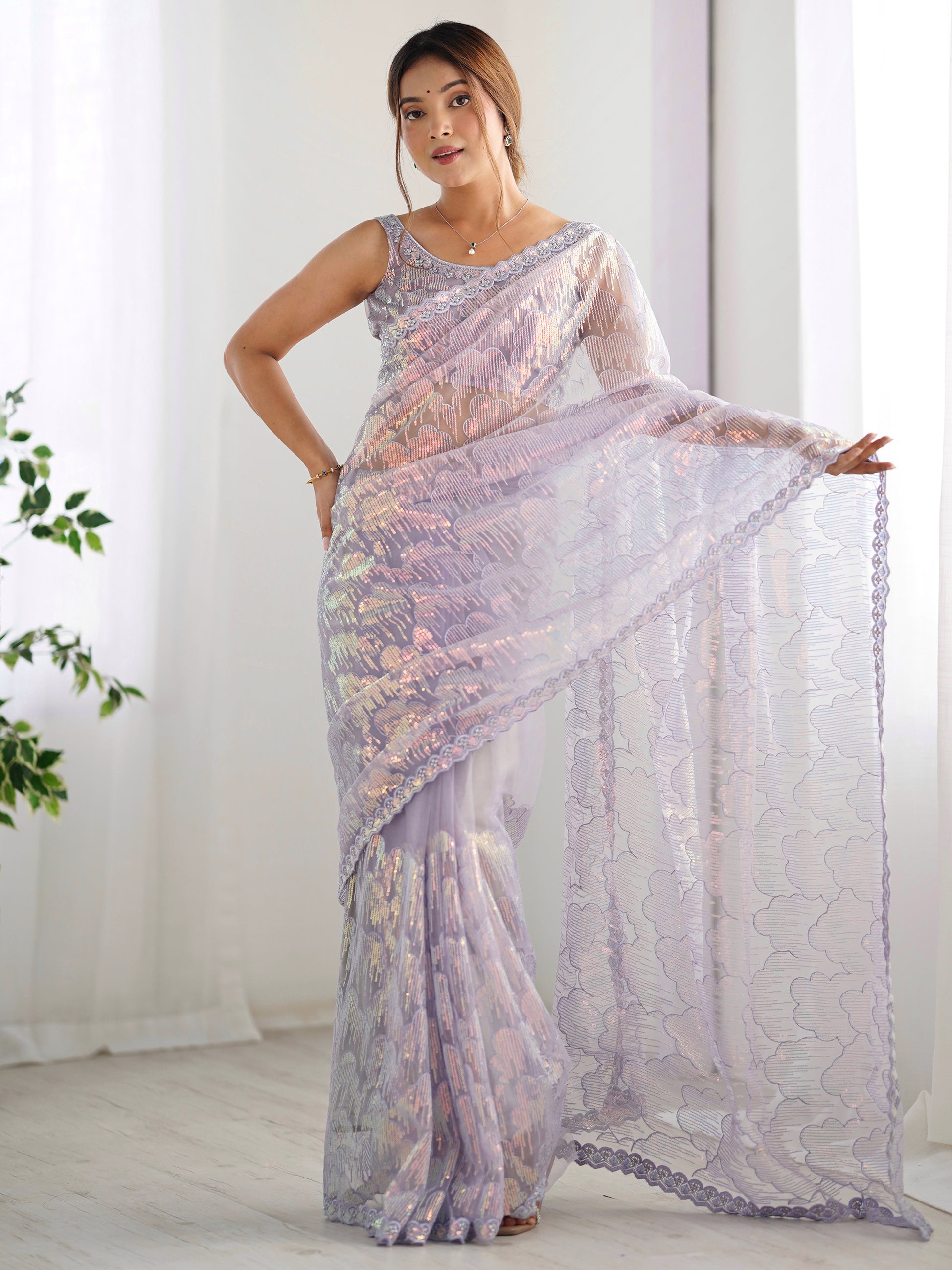 Charming Lavender Sequins Net Party Wear Saree With Blouse