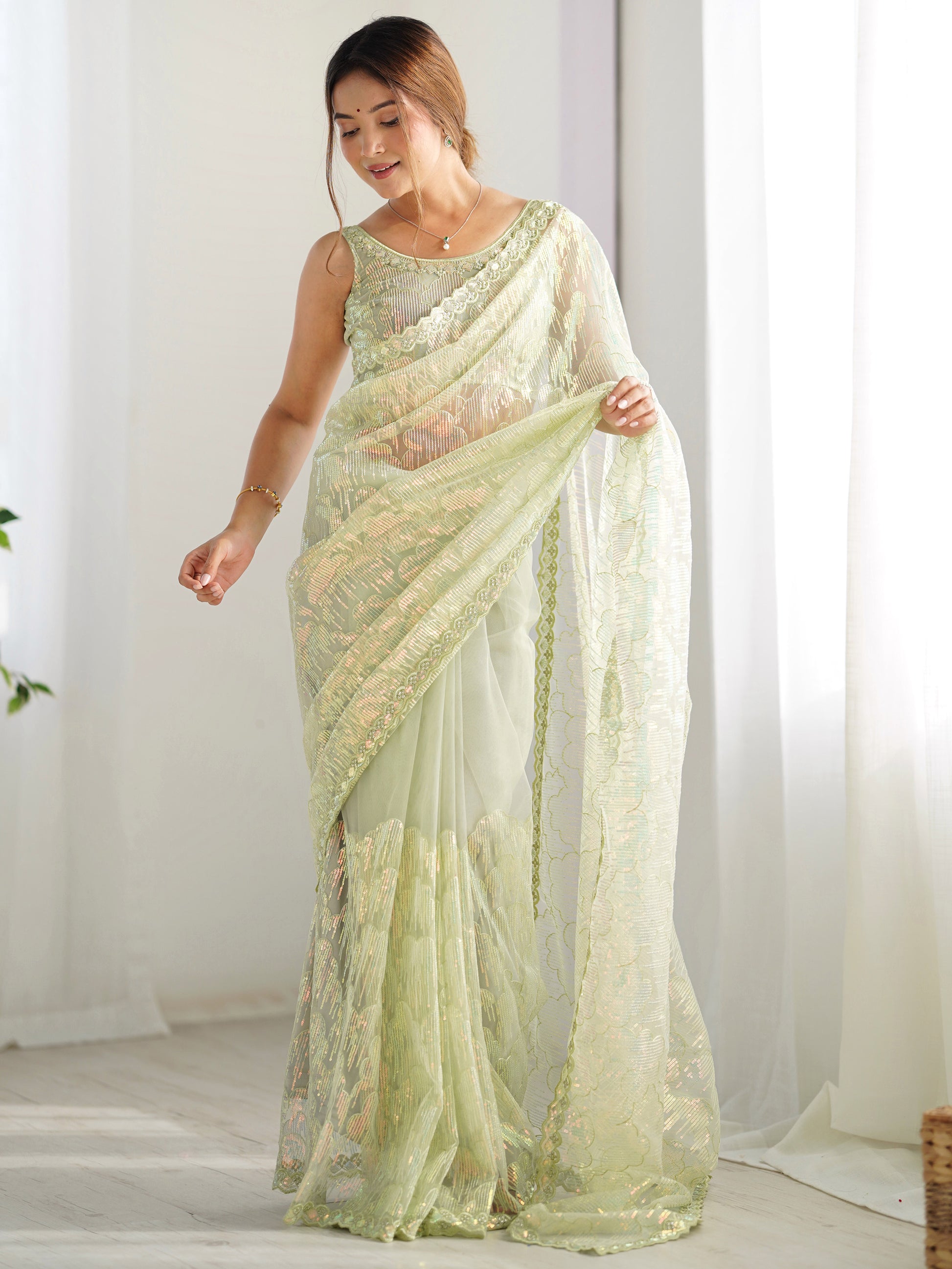 Attractive Pista Green Sequins Net Festival Wear Saree With Blouse