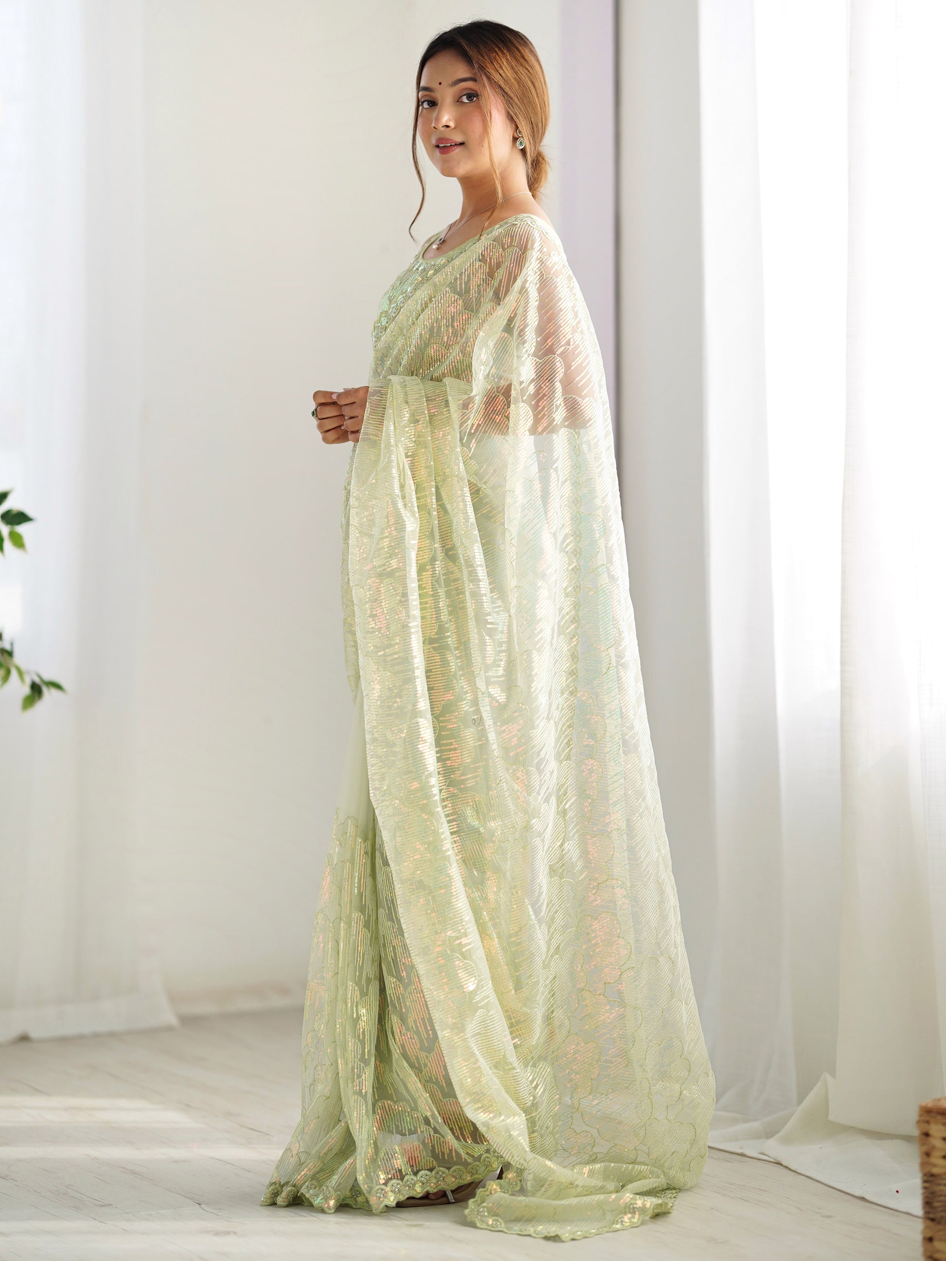 Attractive Pista Green Sequins Net Festival Wear Saree With Blouse